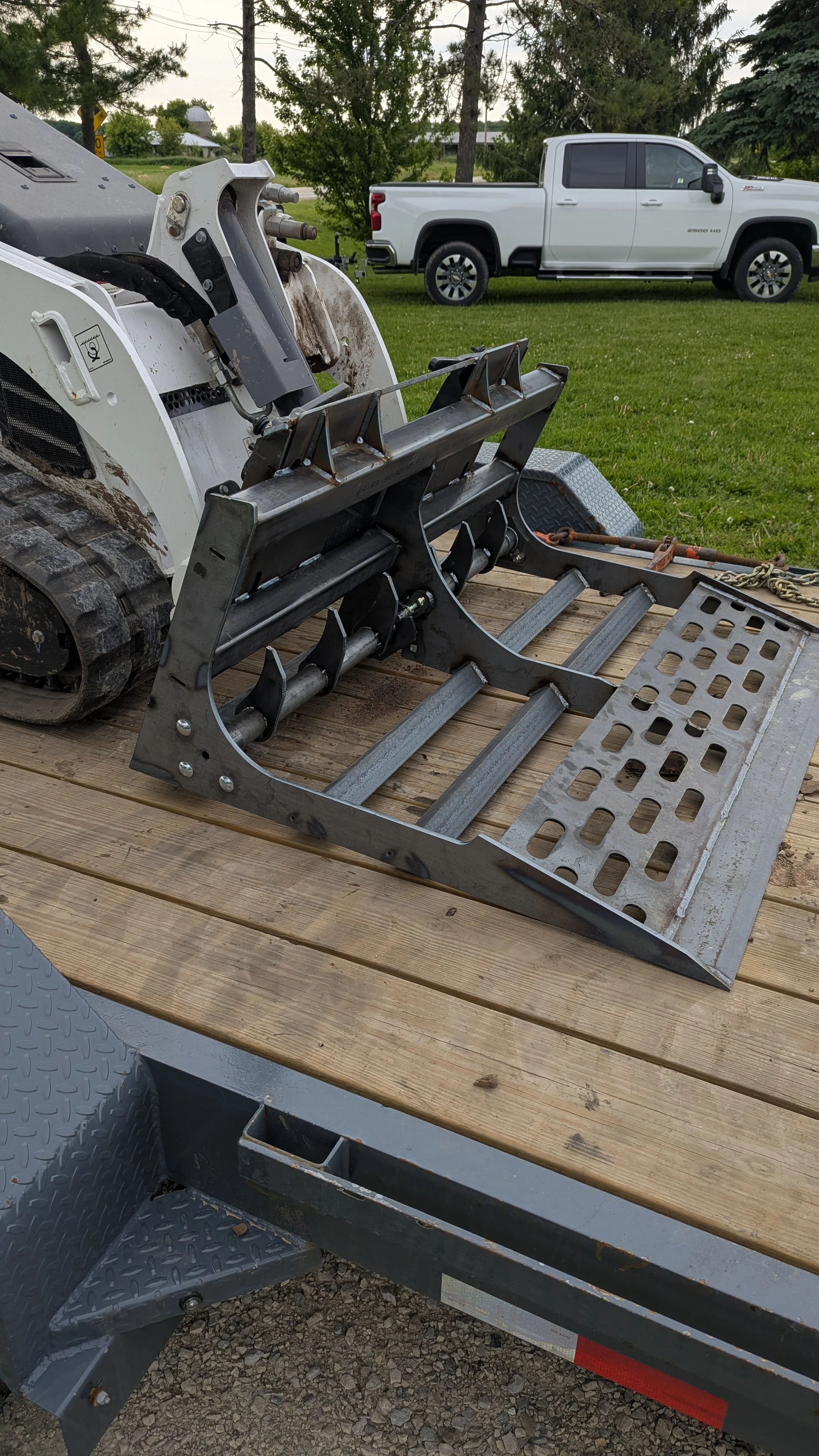 07_on_white_mini_loader_on_trailer.jpg (Copy)