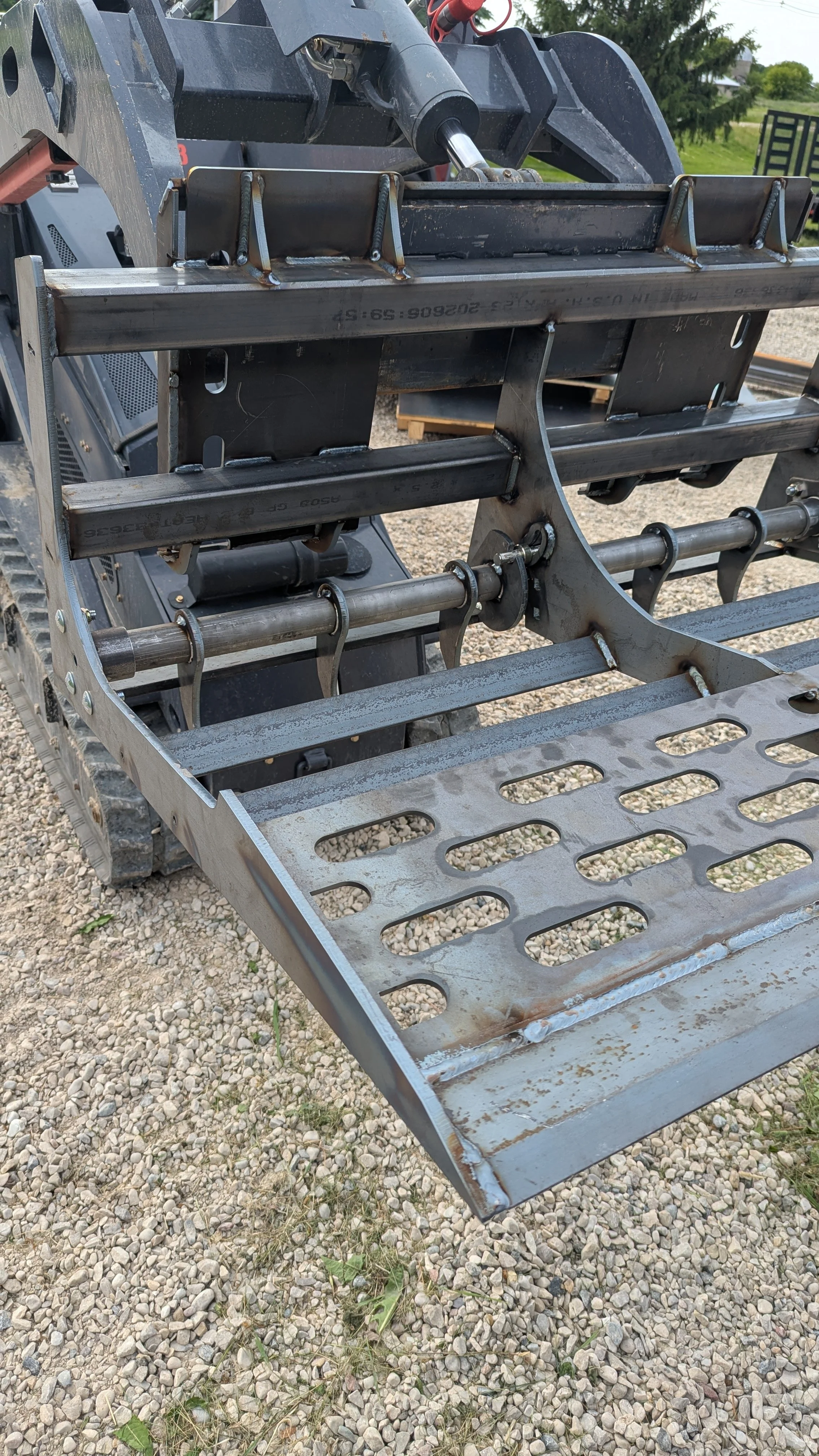 03_outdoor_gravel_on_black_track_loader.jpg (Copy)