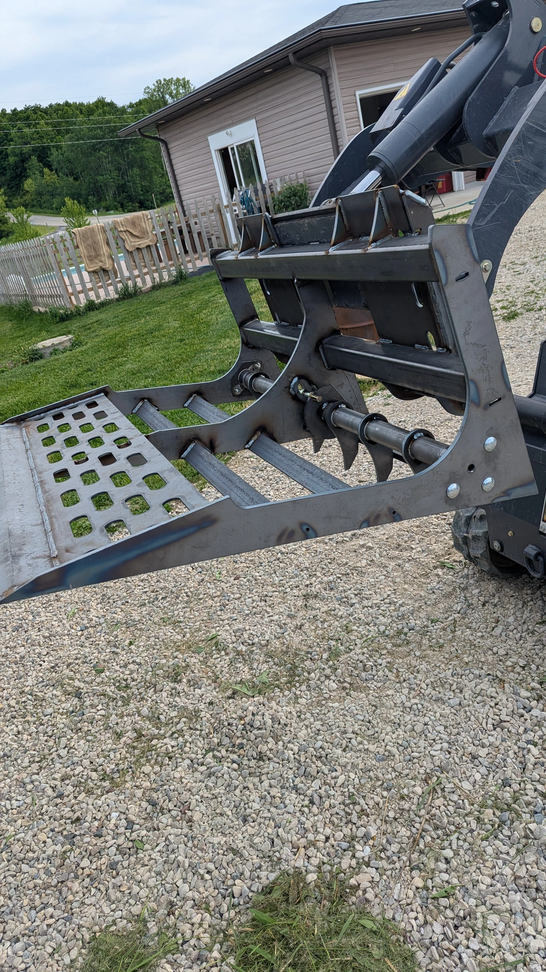 01_outdoor_raised_showing_dual_blades_and_scarifiers.jpg (Copy)