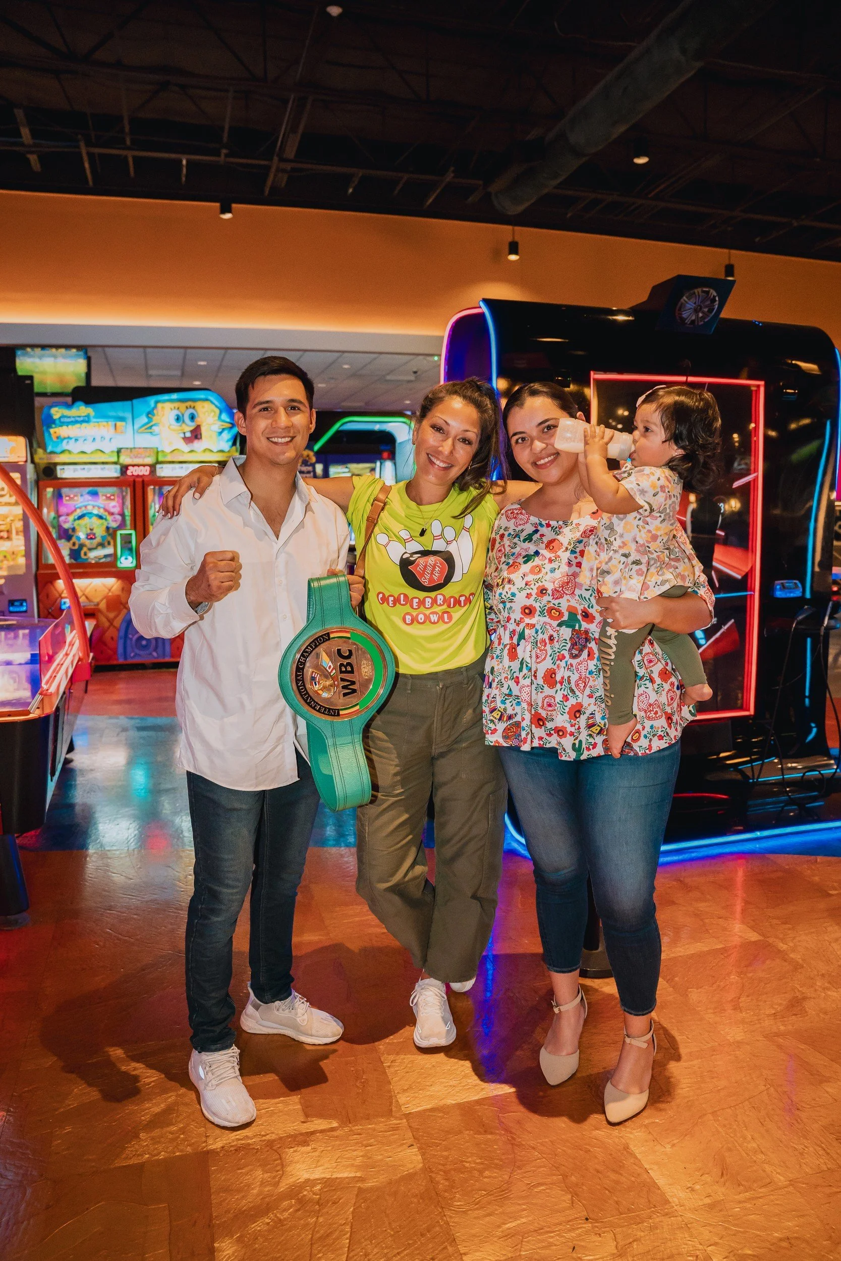 Small group posing together at the bowling event.