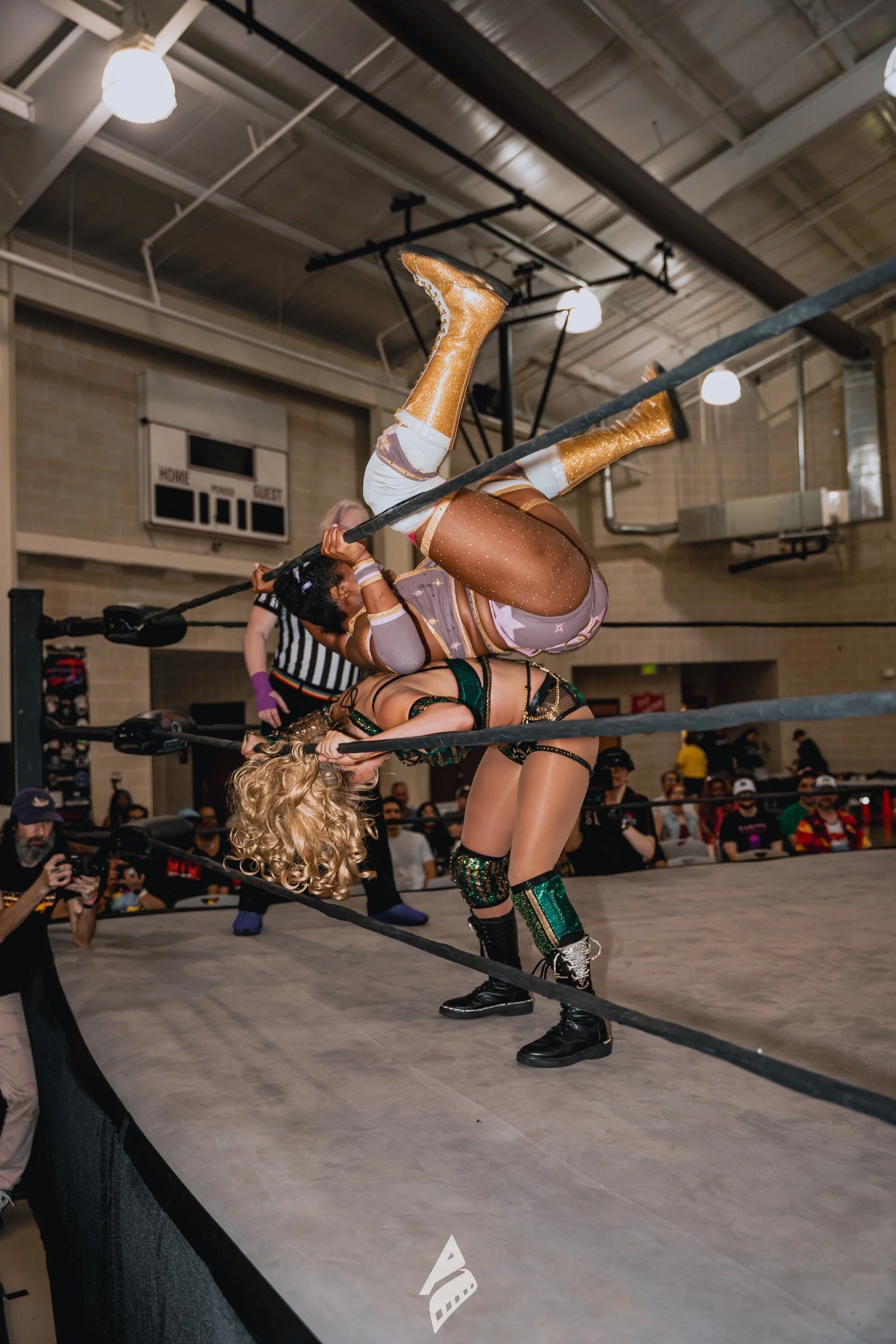 An airborne wrestling move in the ring.