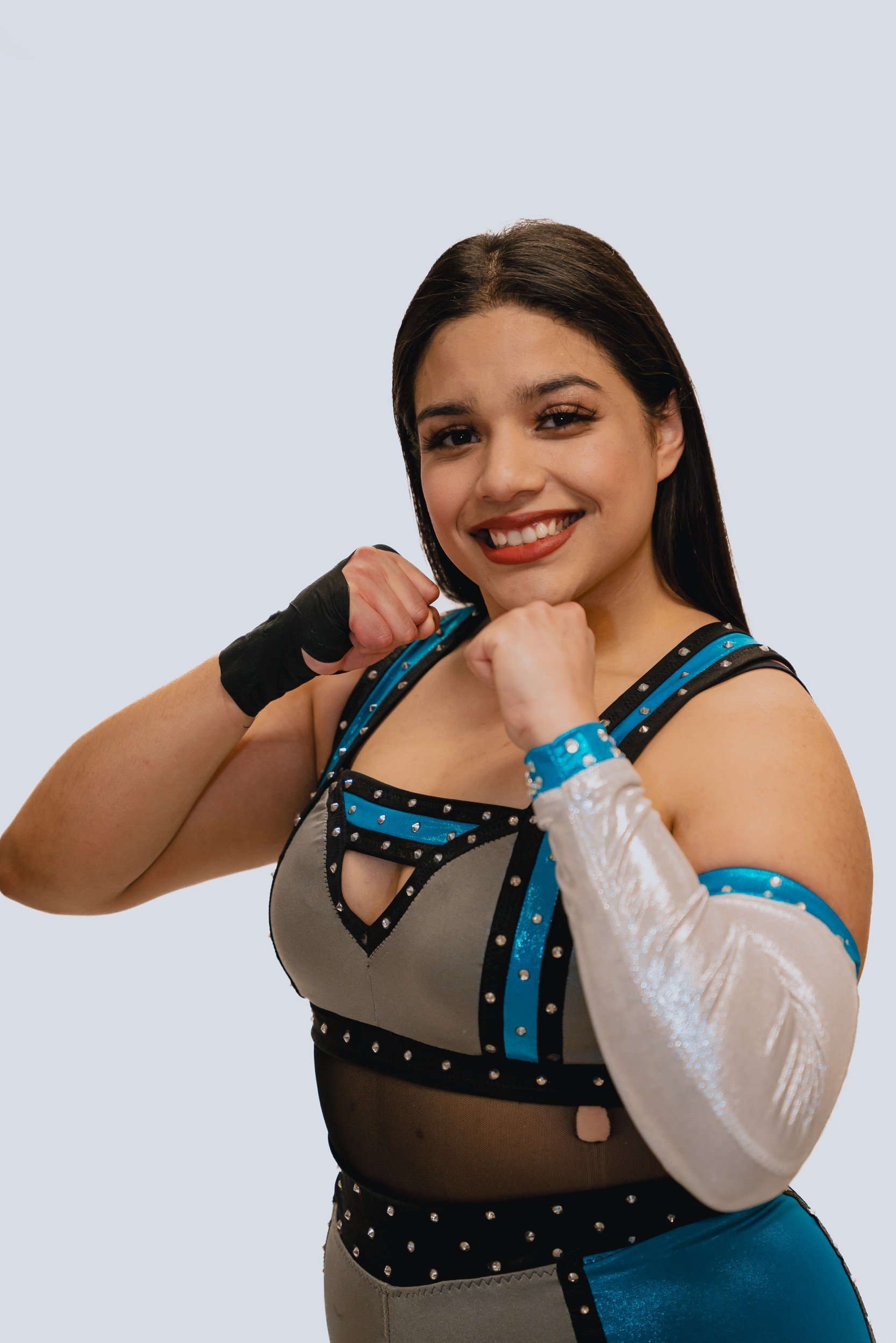 Smiling close-up promotional portrait.