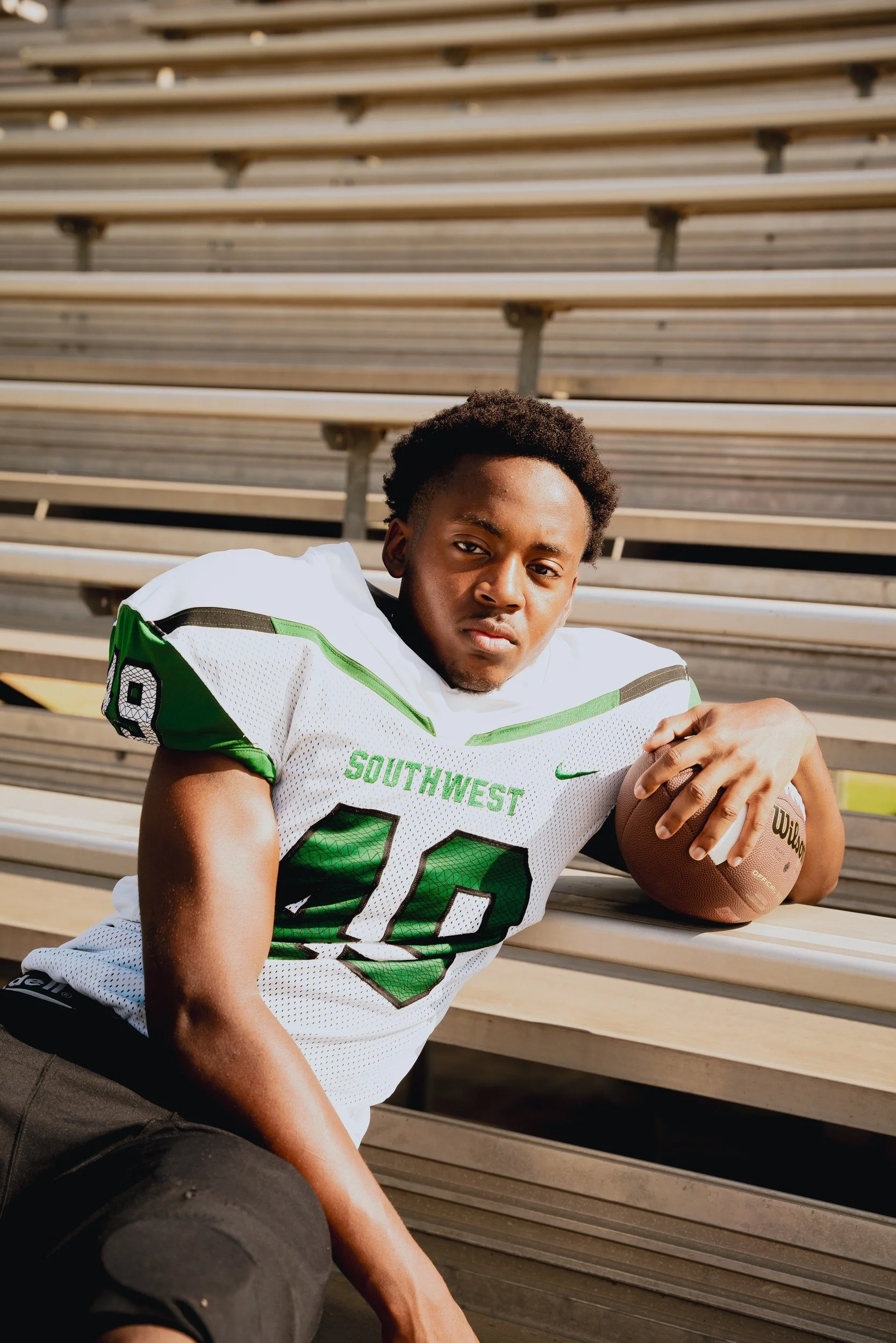 Relaxed athlete portrait on the bleachers.