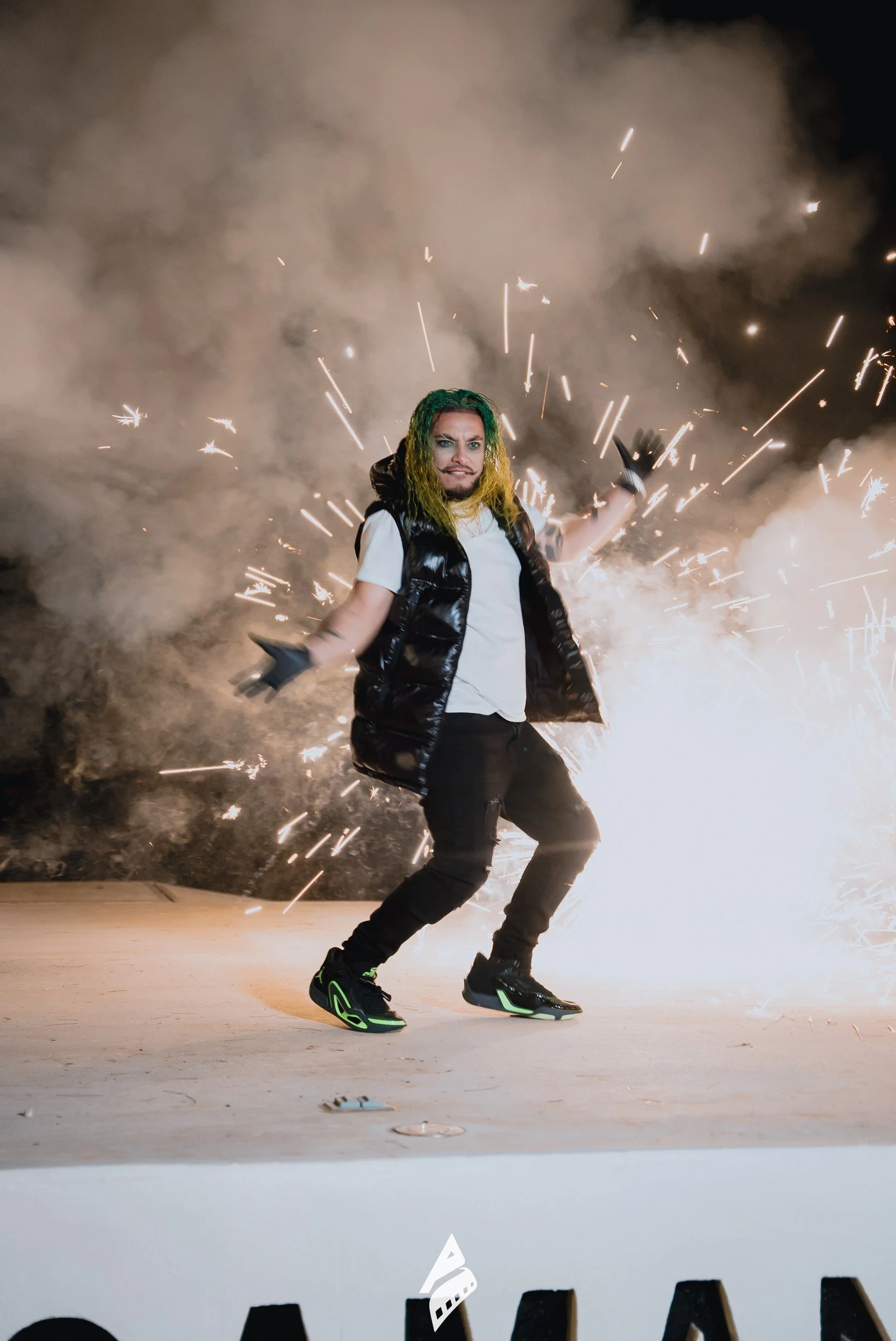 Outdoor creative scene with sparks and smoke.