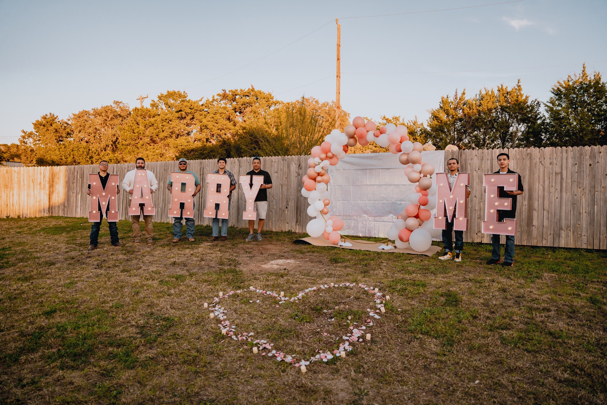 Balloon arch and decorated proposal setting.