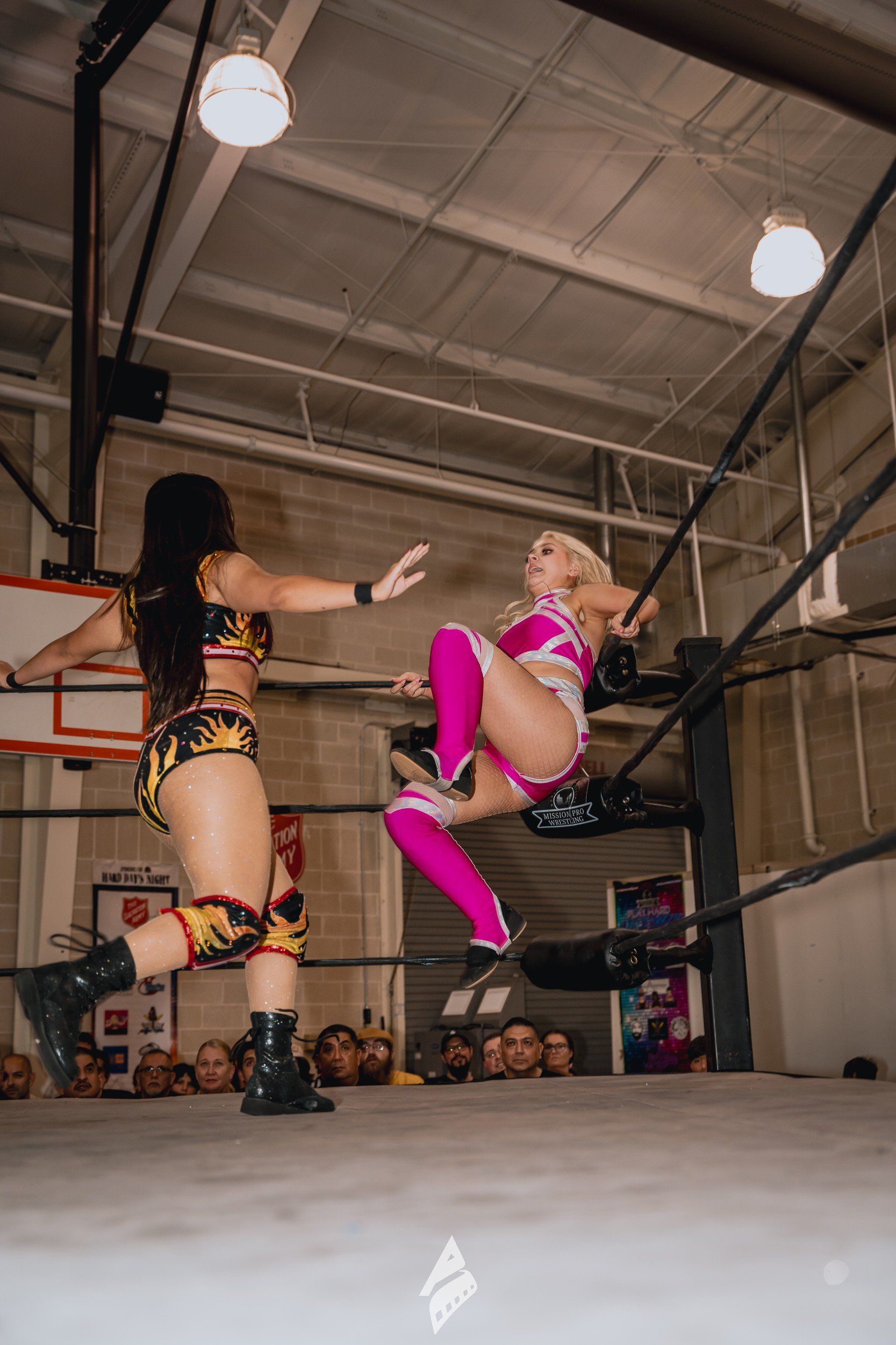 A jumping kick during a match.