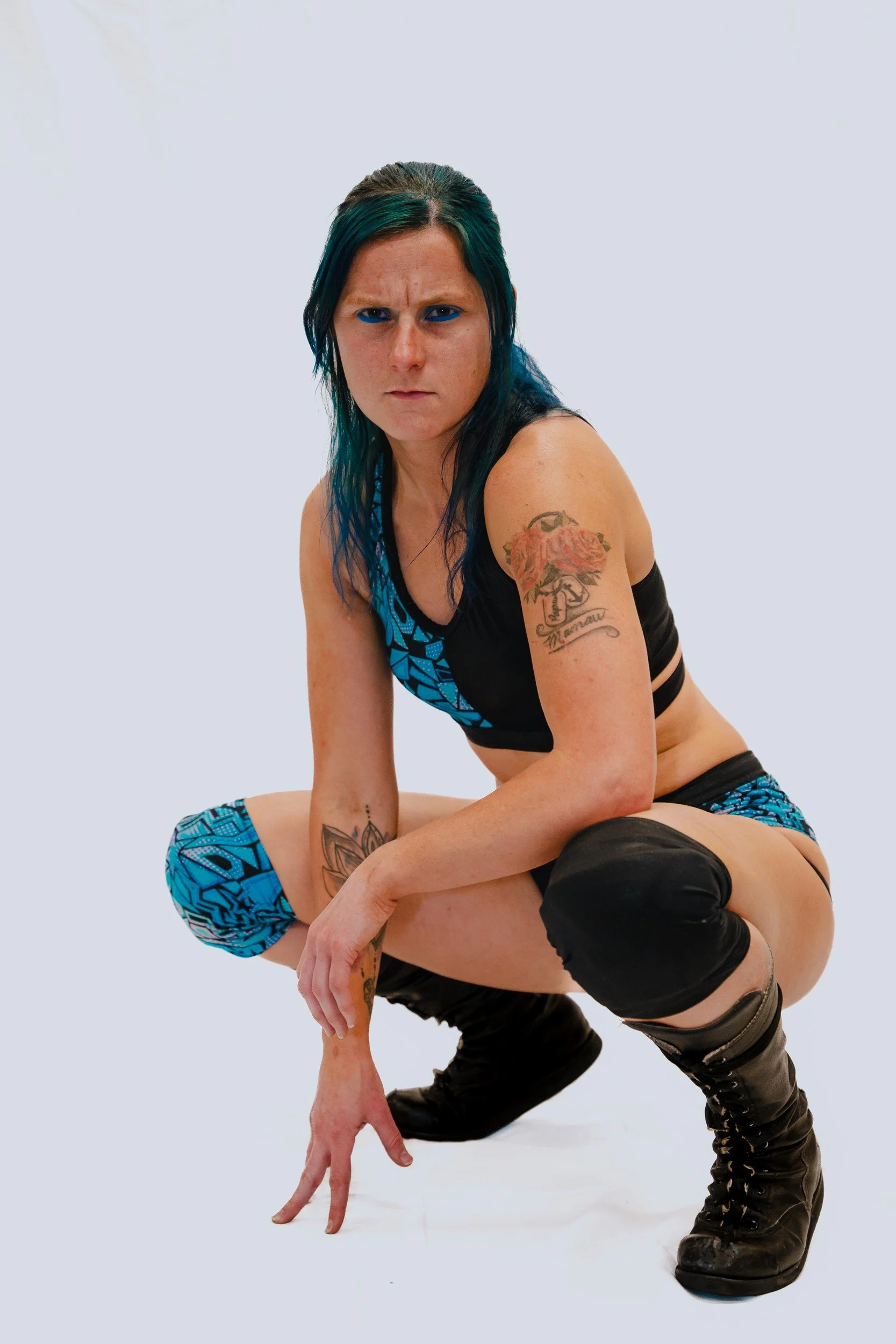 Performer in a low crouched pose.