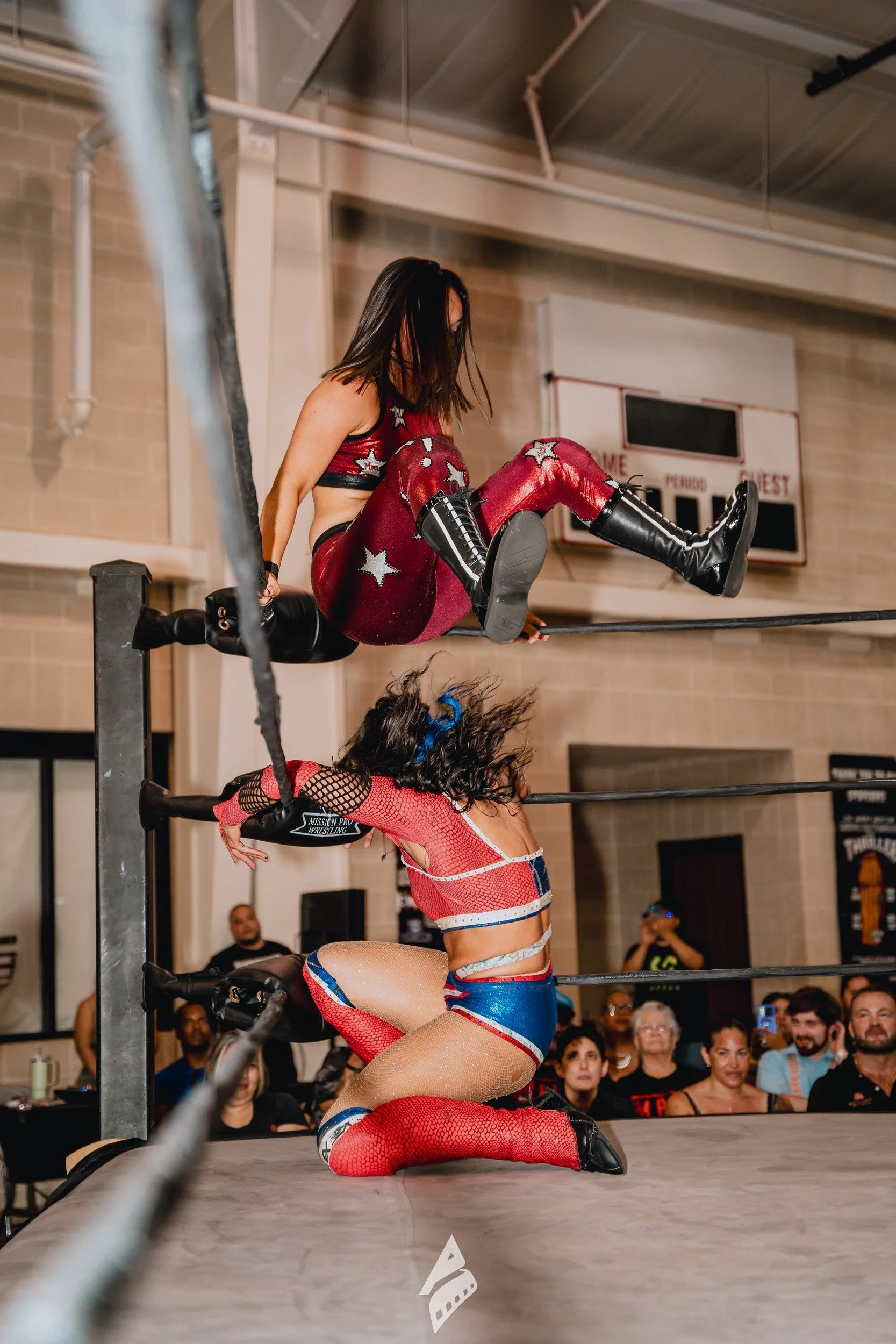 Wrestler leaping from the corner.