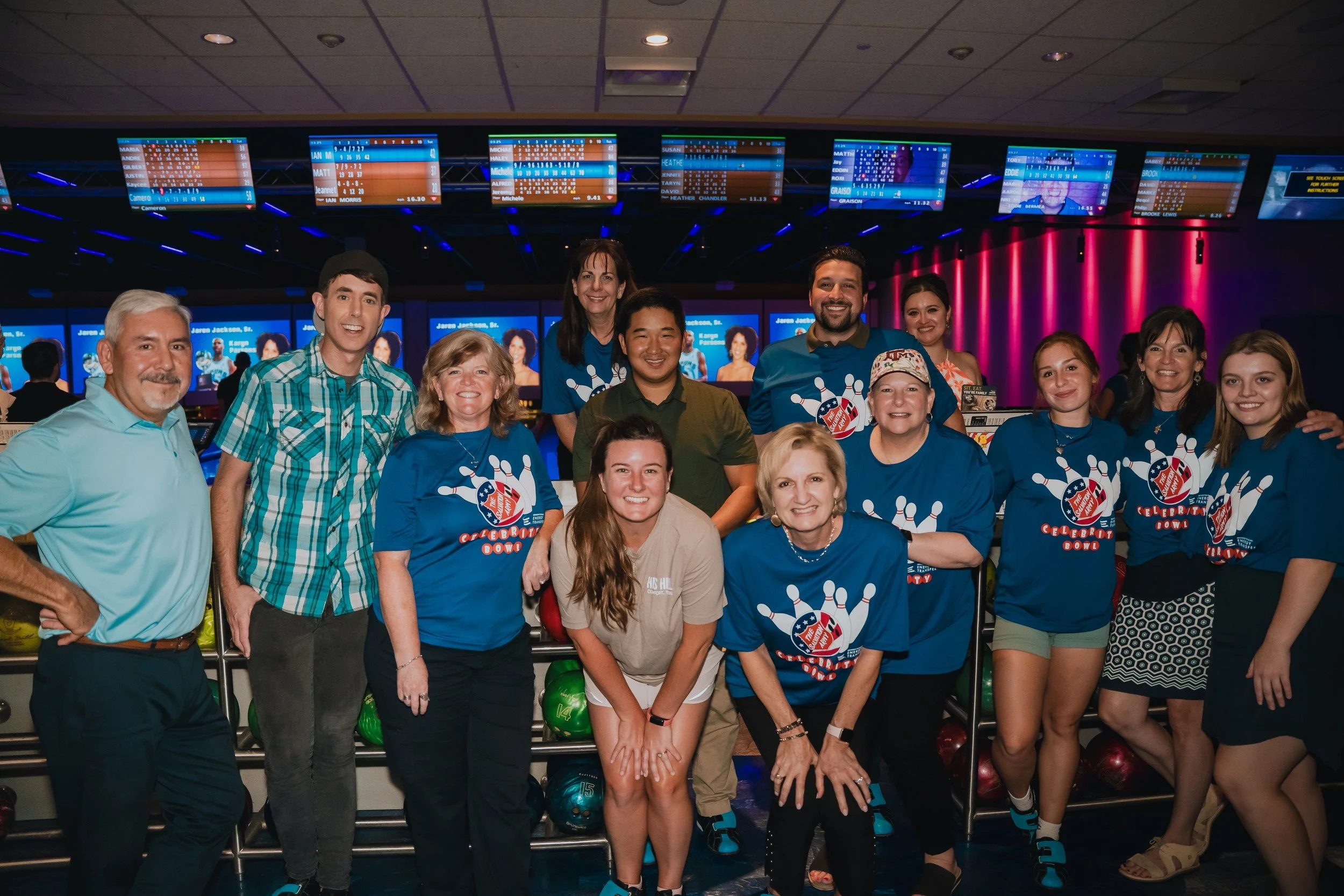Group portrait at the bowling venue.