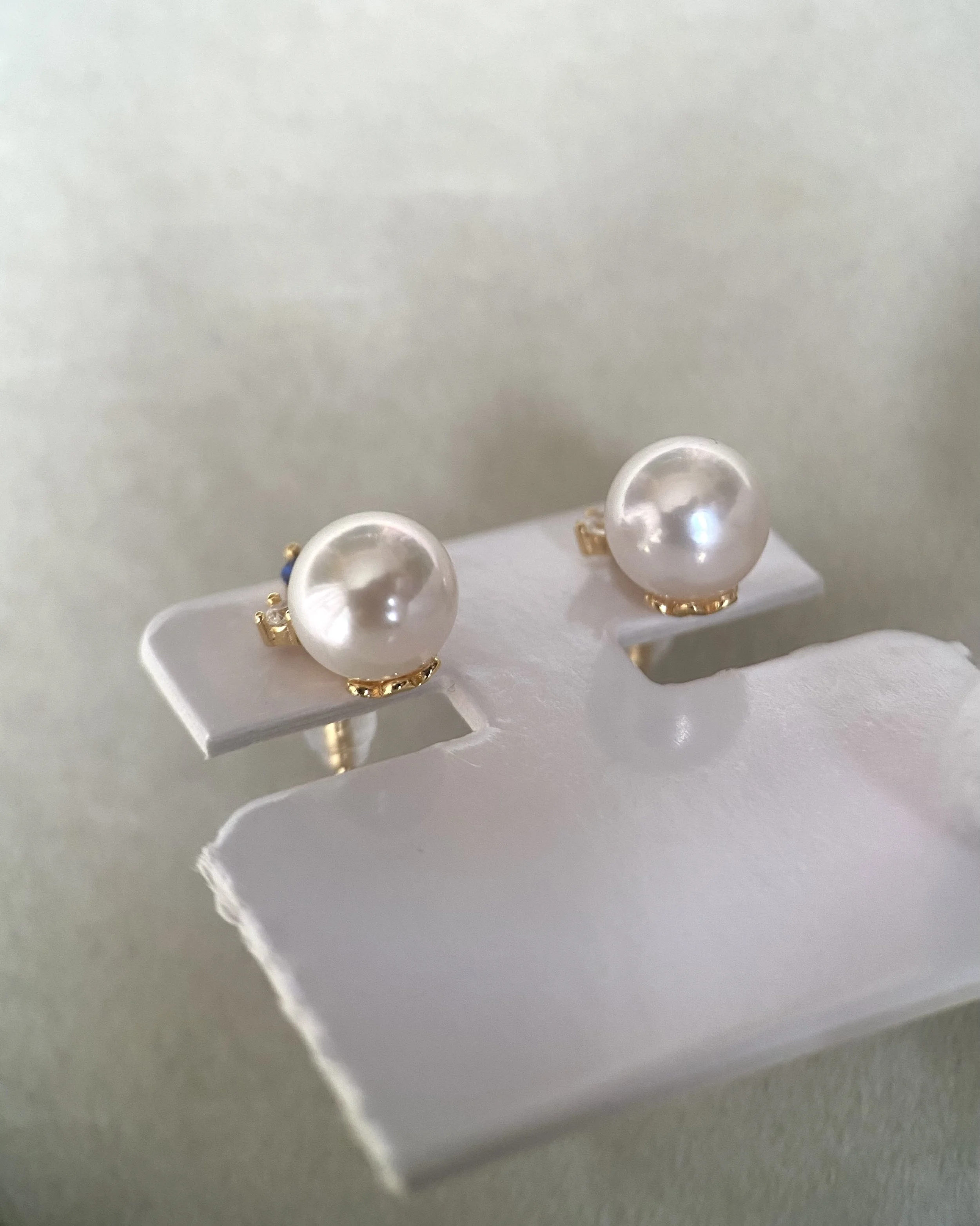 Japanese Exhibition 7.9mm Classic White Akoya Pearl Stud Earrings, Sapphire Blue Botanical Leaf Design, S925 Silver with CZ Accents Starlit Pearls