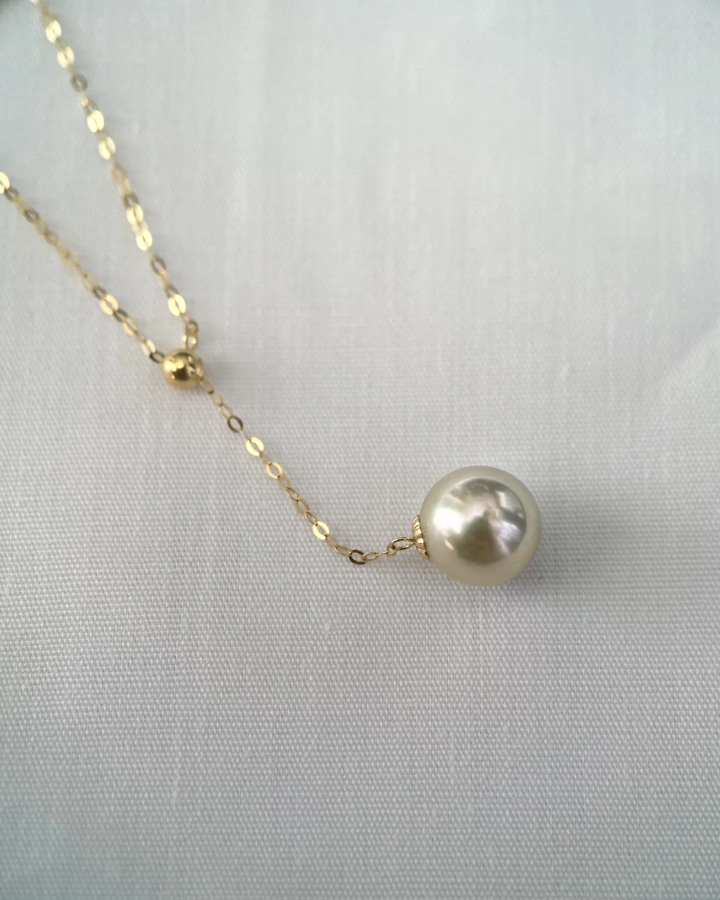 Radiant 8-8.5mm Japanese Amami Oshima Seawater Cultured Golden Pearl Earrings, Hint of Lime Green Overtones, 18K Gold Dangle Settings, Spotlight Luxury