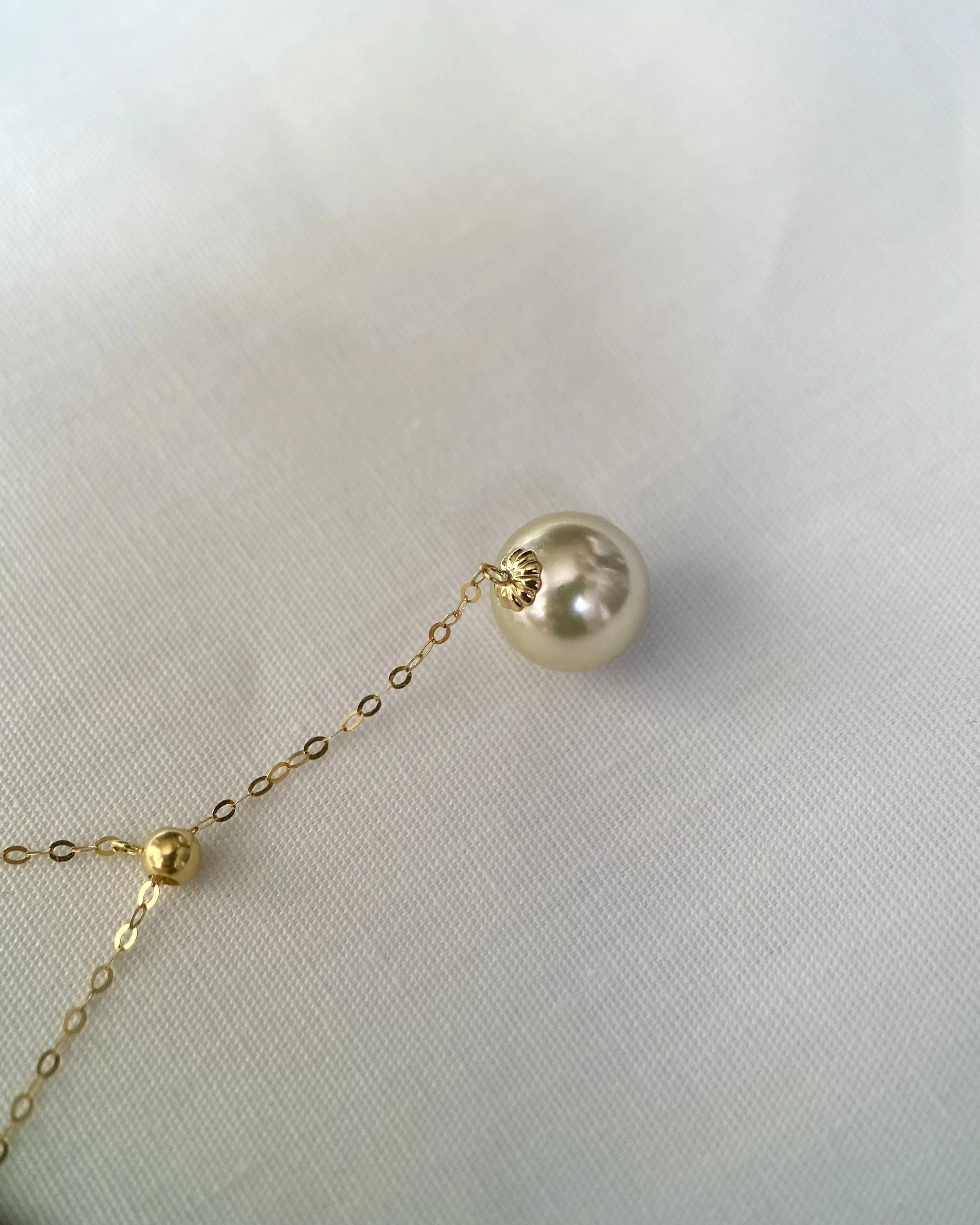 Radiant 8-8.5mm Japanese Amami Oshima Seawater Cultured Golden Pearl Earrings, Hint of Lime Green Overtones, 18K Gold Dangle Settings, Spotlight Luxury