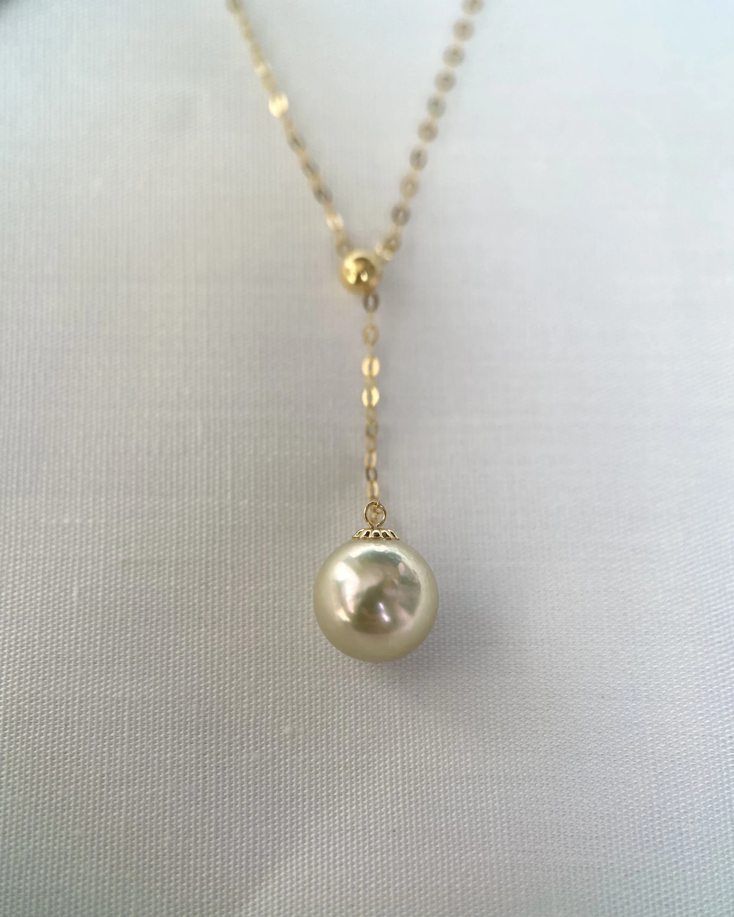 Radiant 8-8.5mm Japanese Amami Oshima Seawater Cultured Golden Pearl Earrings, Hint of Lime Green Overtones, 18K Gold Dangle Settings, Spotlight Luxury