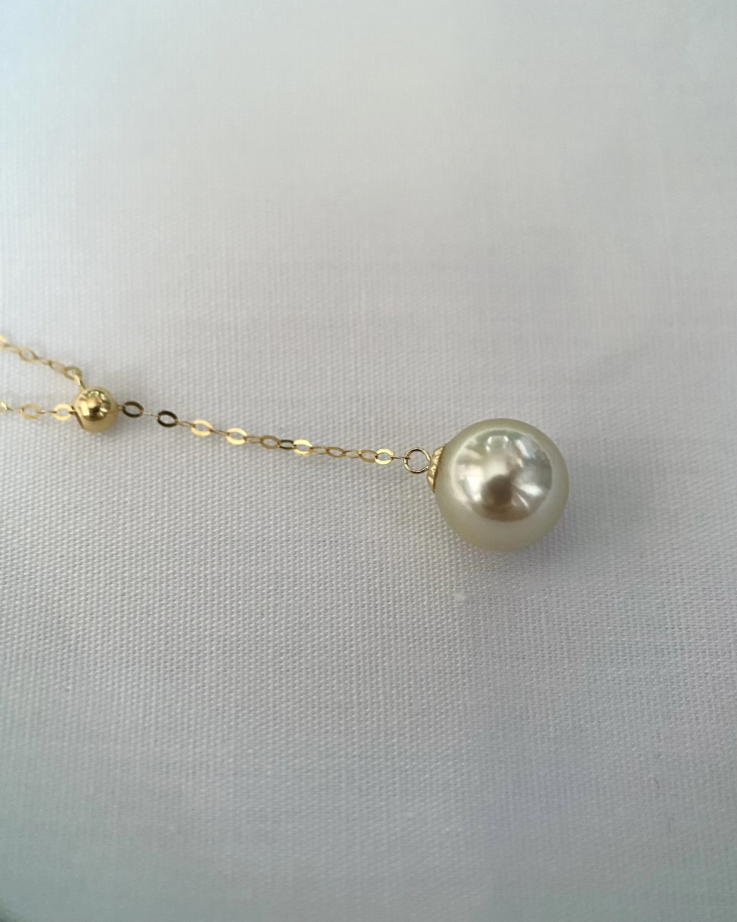 Radiant 8-8.5mm Japanese Amami Oshima Seawater Cultured Golden Pearl Earrings, Hint of Lime Green Overtones, 18K Gold Dangle Settings, Spotlight Luxury