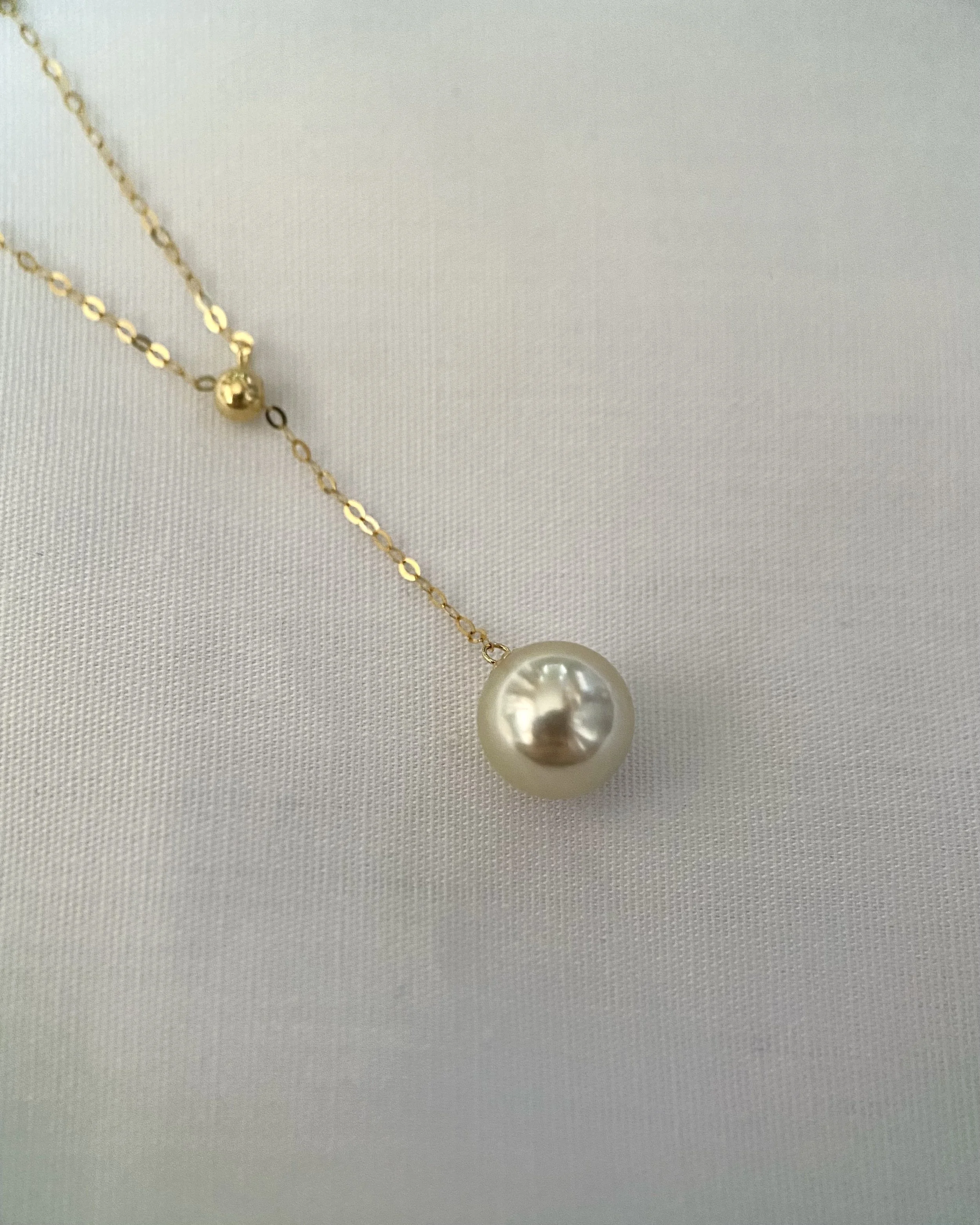 Radiant 8-8.5mm Japanese Amami Oshima Seawater Cultured Golden Pearl Earrings, Hint of Lime Green Overtones, 18K Gold Dangle Settings, Spotlight Luxury
