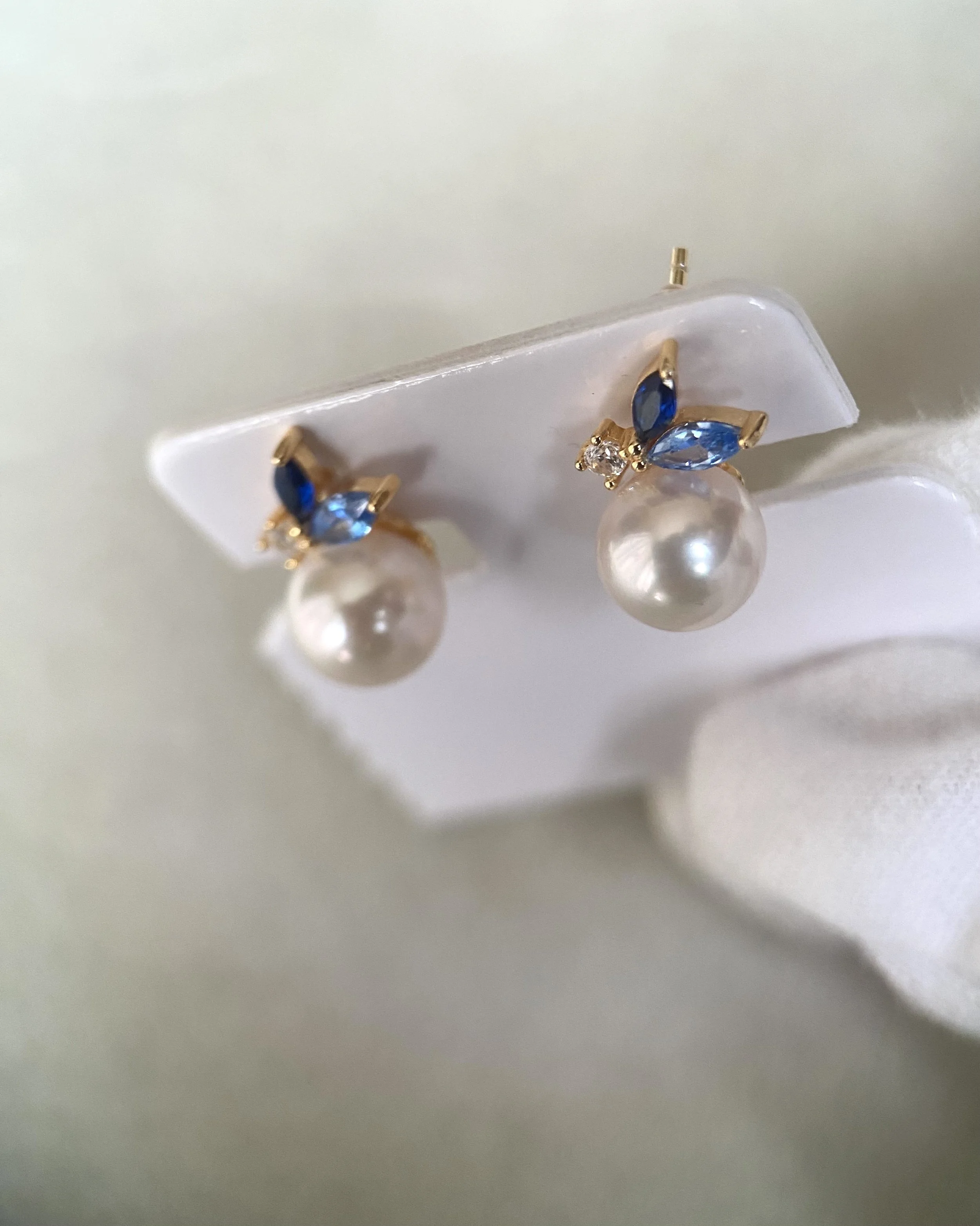 Japanese Exhibition 7.9mm Classic White Akoya Pearl Stud Earrings, Sapphire Blue Botanical Leaf Design, S925 Silver with CZ Accents Starlit Pearls