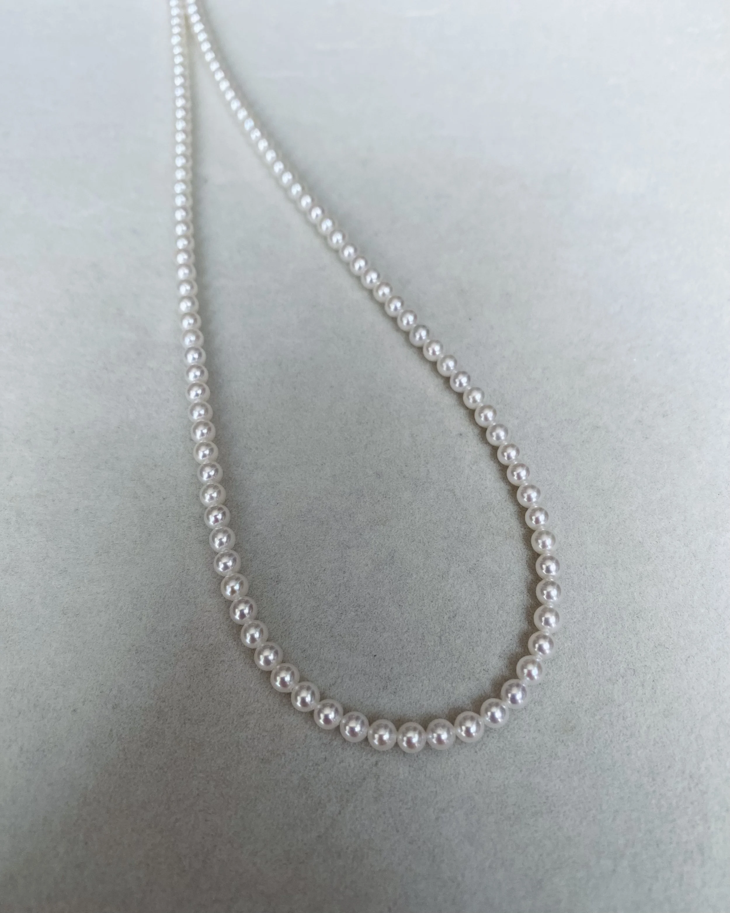 18.7" Long Mini White Freshwater Pearl Necklace 3.5-4mm – Serpent-Inspired S925 Silver Clasp with Emerald CZ Eyes, Wedding or Gifting Starlit Pearls
