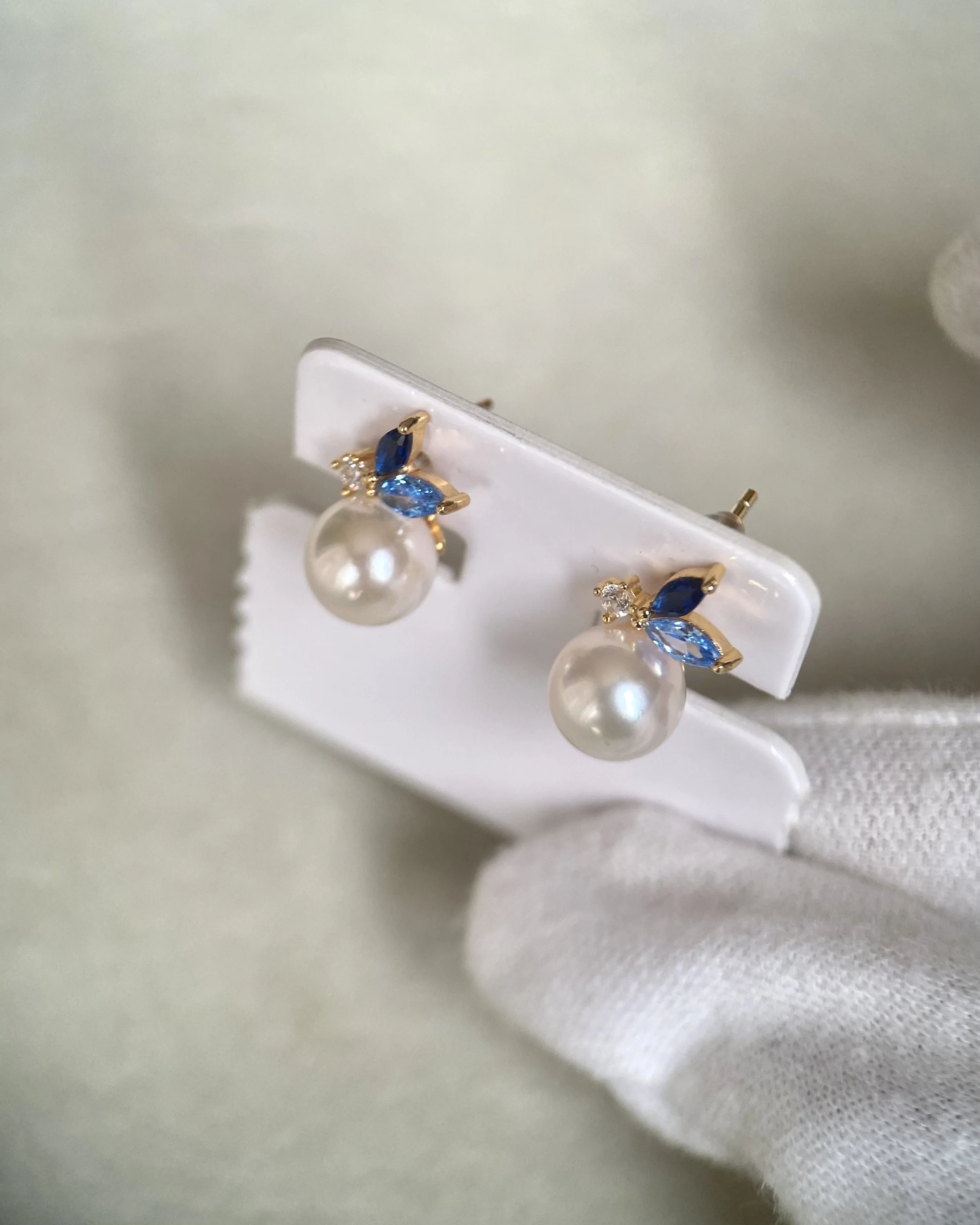 Japanese Exhibition 7.9mm Classic White Akoya Pearl Stud Earrings, Sapphire Blue Botanical Leaf Design, S925 Silver with CZ Accents Starlit Pearls