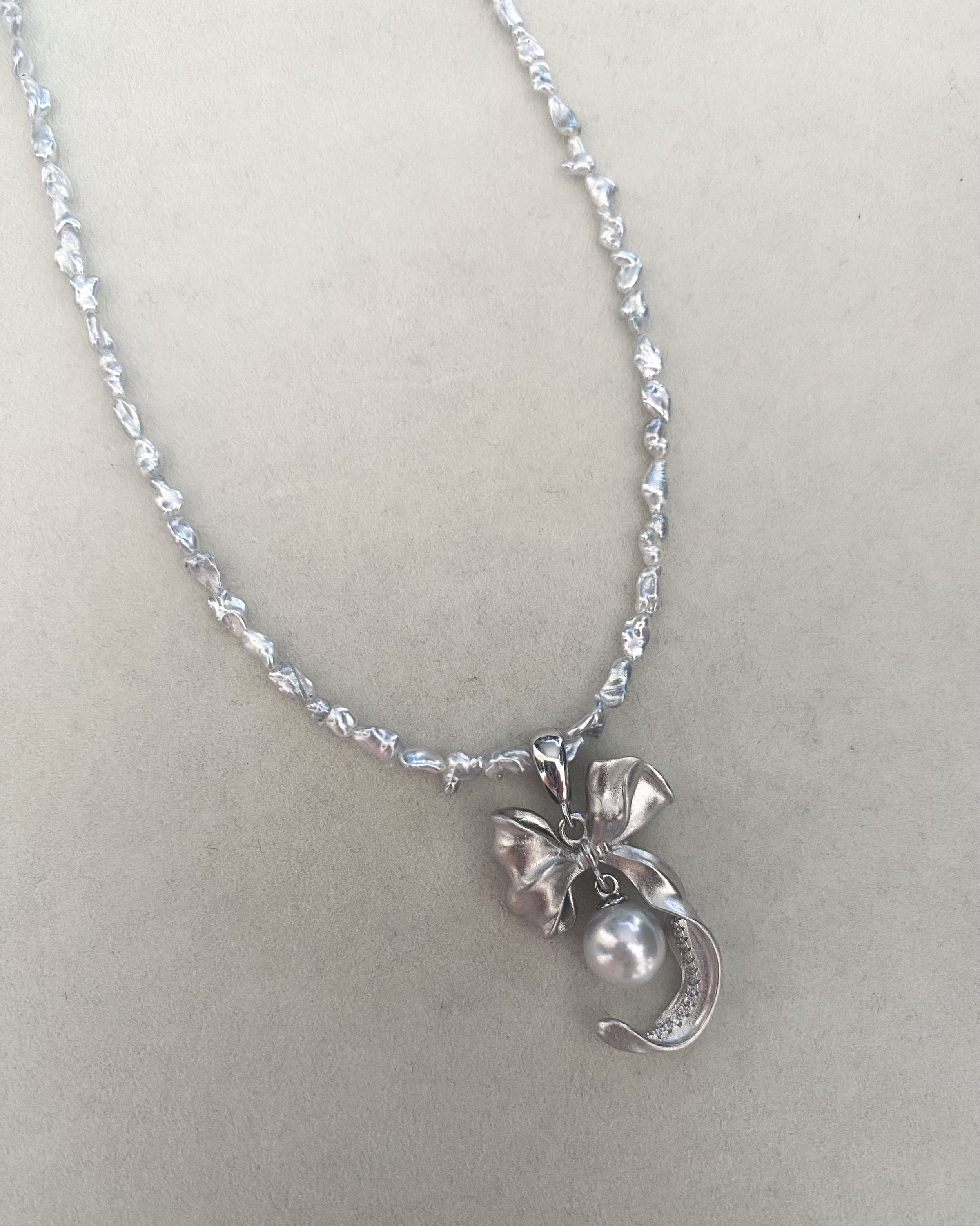 Collector's Grade Australian Silver-White South Sea Wild Nucleus-Free Keshi Pearl Necklace, 6x4mm, Iridescent Lustre, 18K White Gold Clasp Starlit Pearls