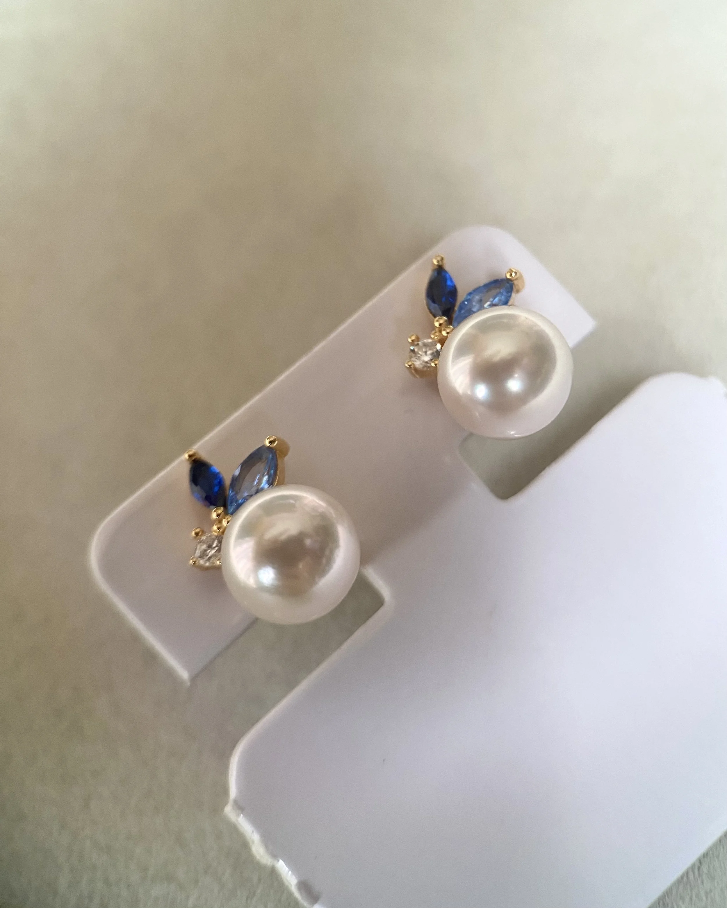 Japanese Exhibition 7.9mm Classic White Akoya Pearl Stud Earrings, Sapphire Blue Botanical Leaf Design, S925 Silver with CZ Accents Starlit Pearls