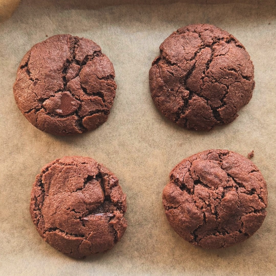 Can you guess how many Islands Chocolate products we used in this one? 👀

One, two, three! These triple chocolate cookies are oozing with goodness as they have a secret chocolatey heart made from our hazelnut spread 🤫