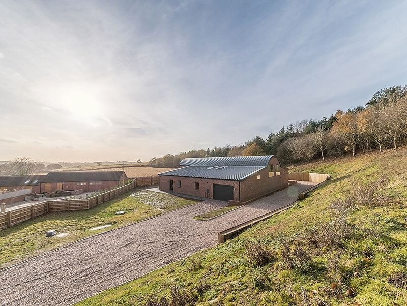 Common Farm Dutch Barn Aerial.jpg