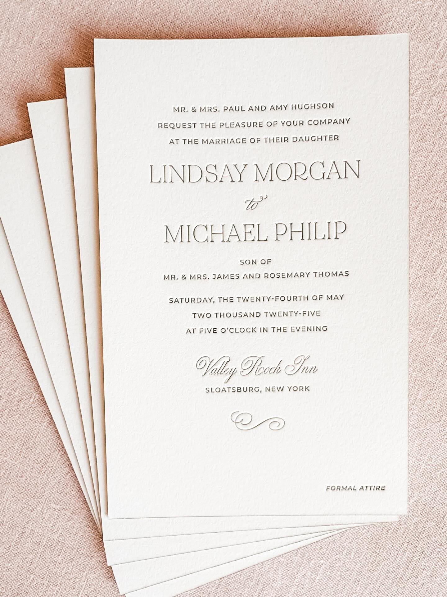 The tactile nature of letterpress never fails to feel like a love letter in itself. For Lindsay and Michael, we leaned into classic elegance with a sage green palette, matching edge painting, and deep impressions on luxuriously thick cotton stock. Qu