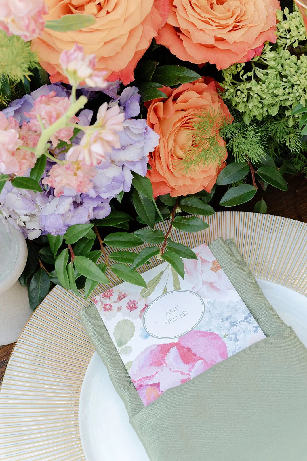 guest name as place card on a floral menu