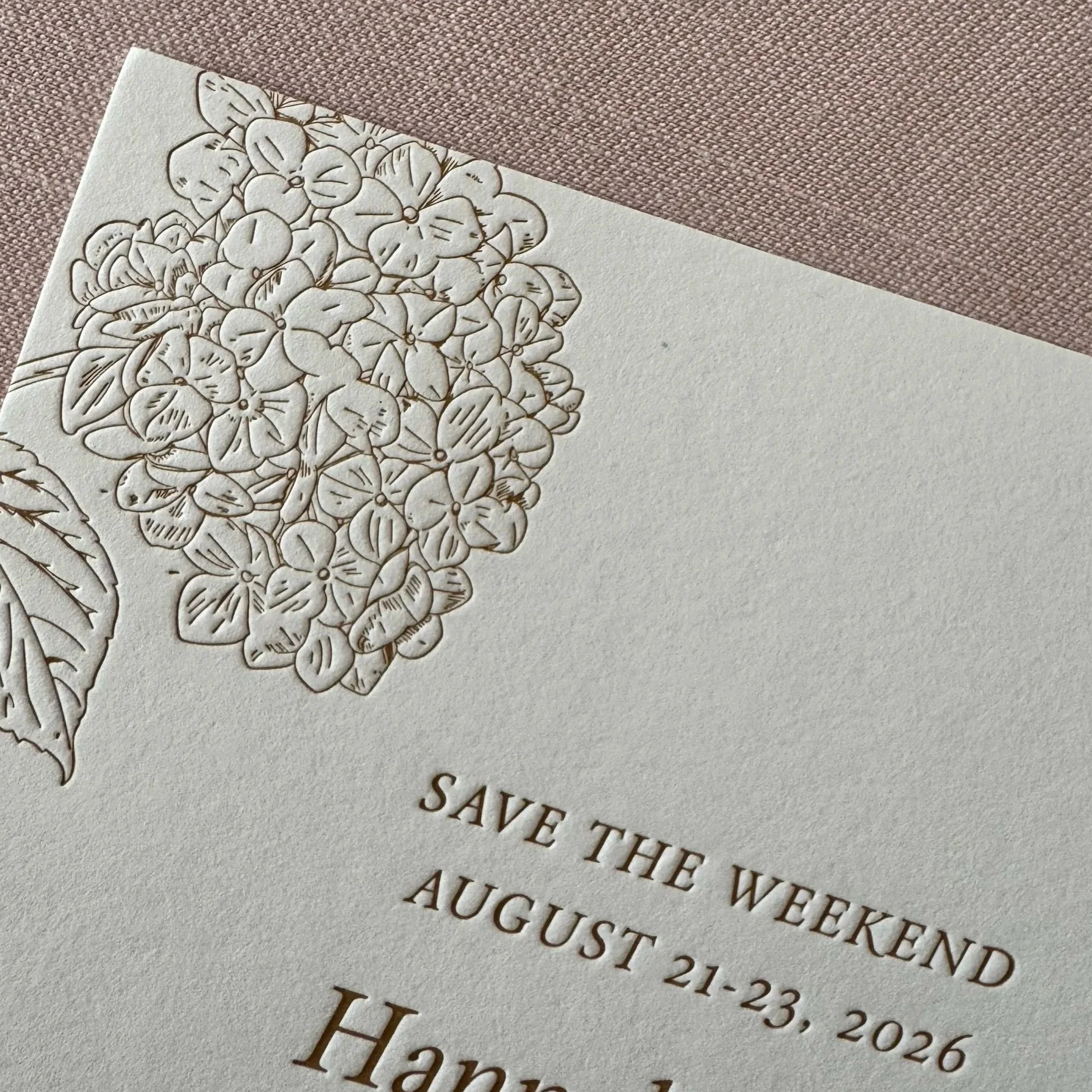 Letterpress save the date featuring custom artwork and classic typography