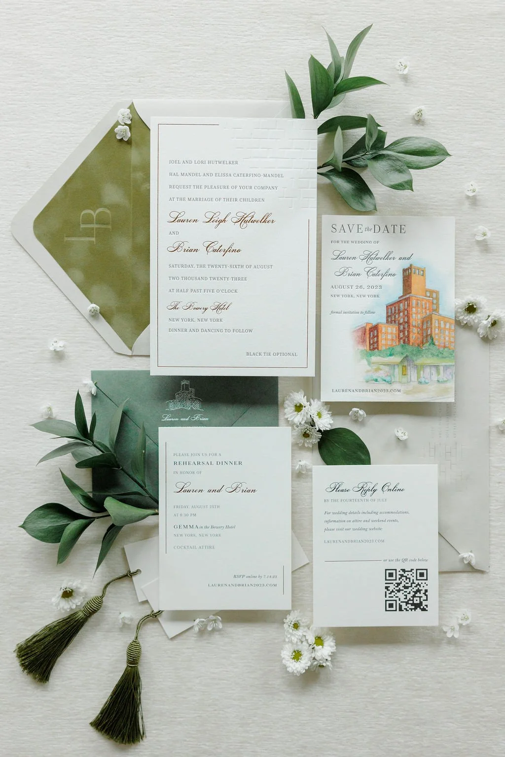 A custom invitation suite with a velvet debossed envelope liner, debossed design on the invitation, along with bronze foil. The featured watercolor save the date is letterpress. This is a beautiful, modern suite with so much texture.