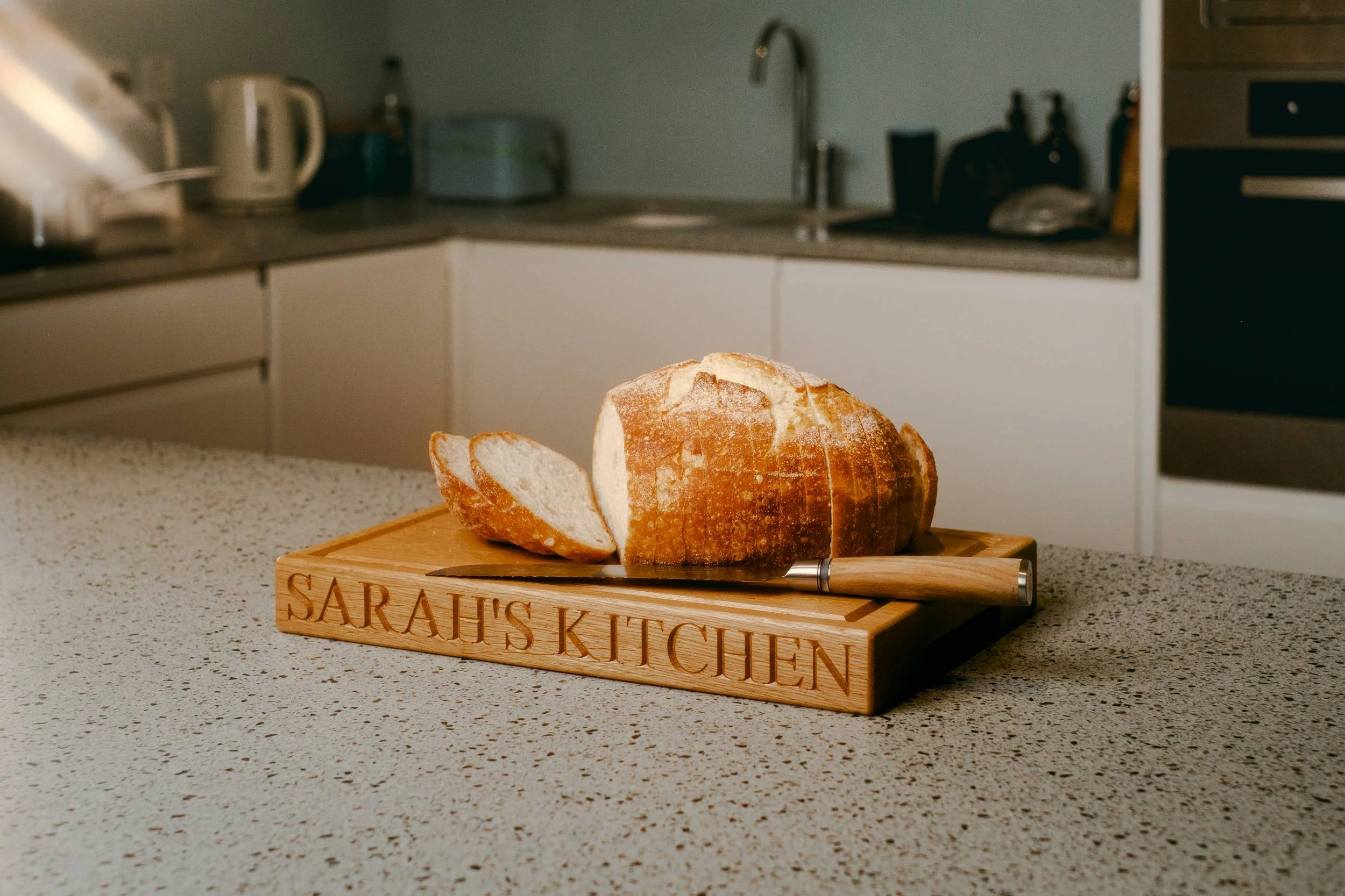 Personalized engraved solid oak chopping board.