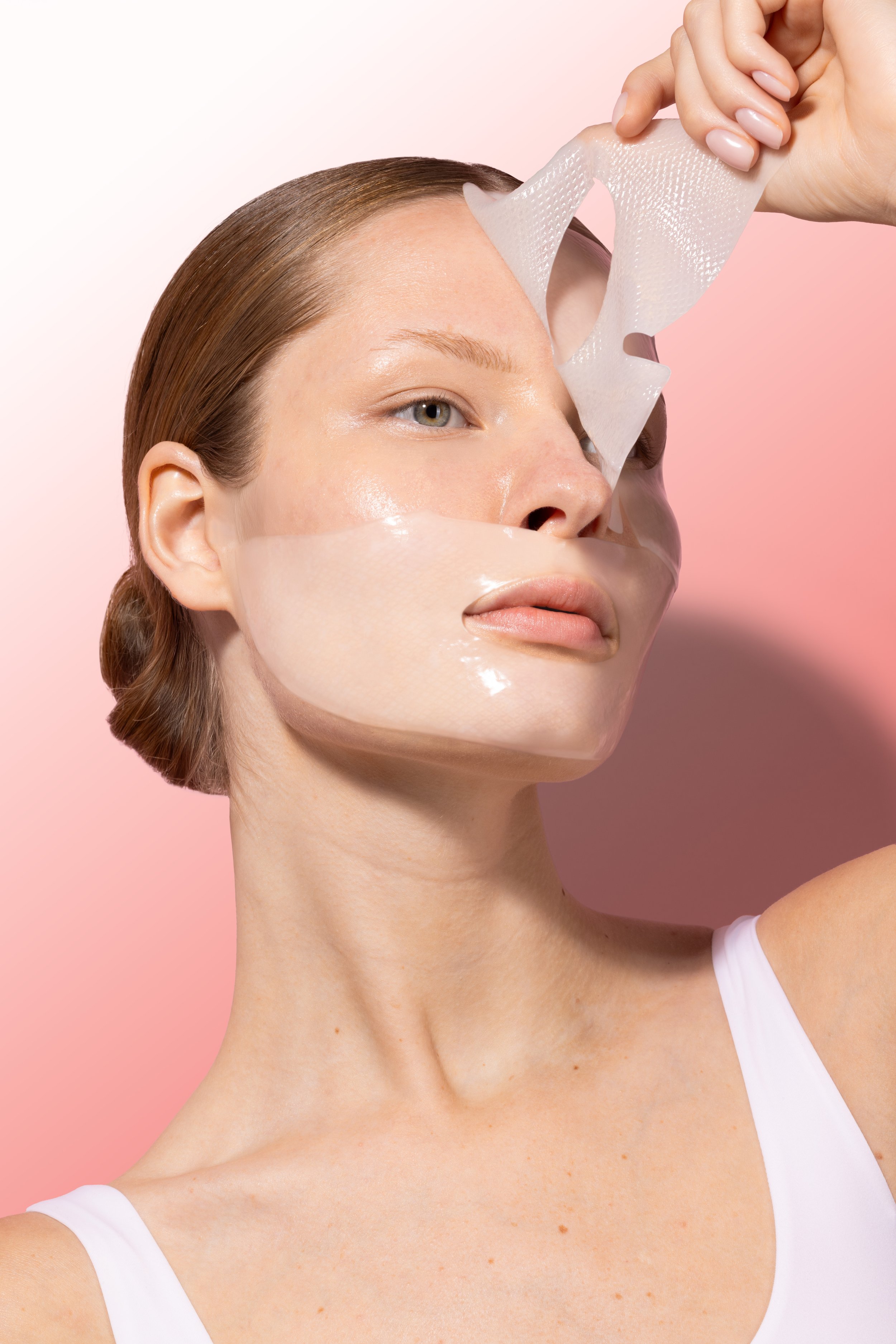 Model Pulling Off Top PDRN Mask.jpg