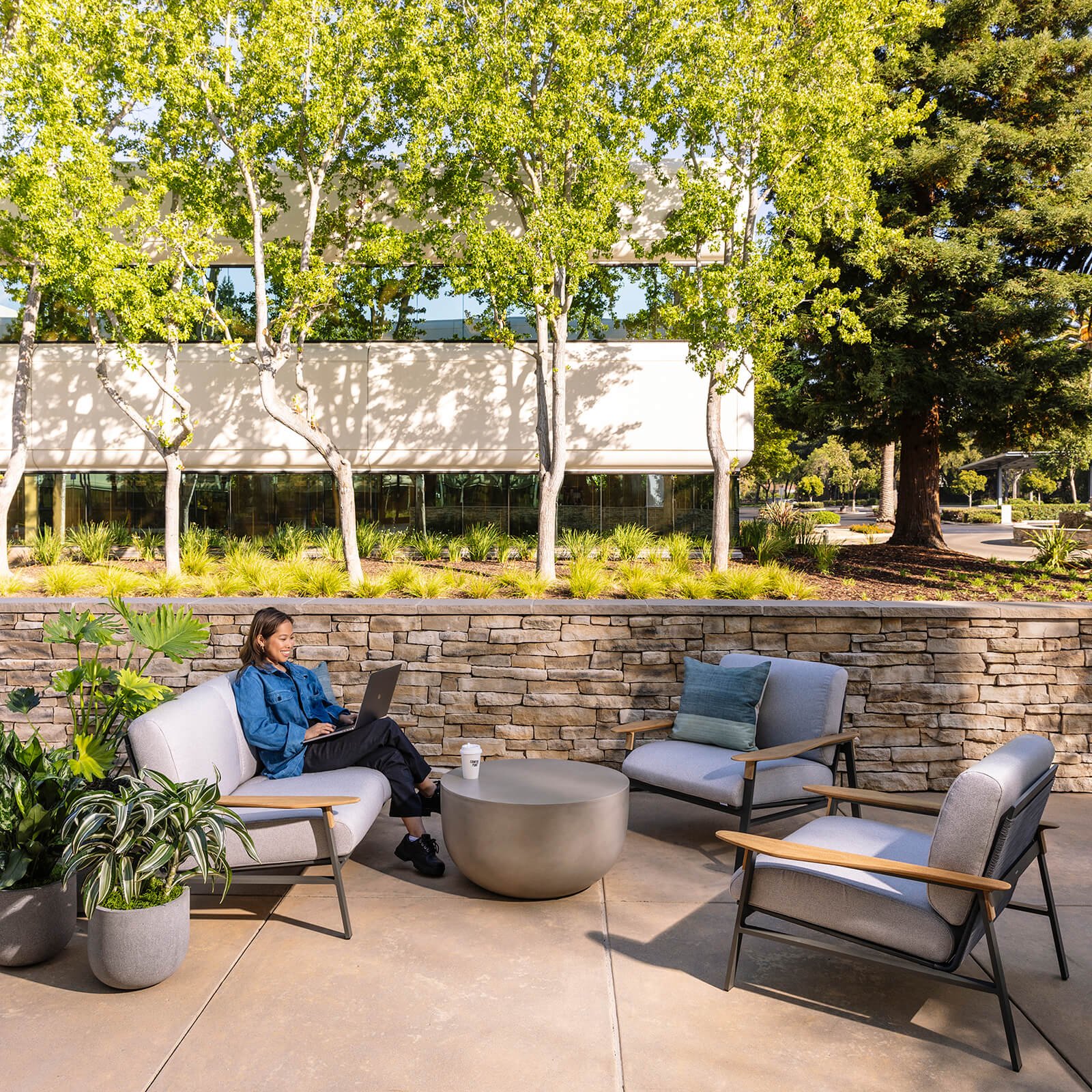  A customer relaxes in one of the comfy outdoor seating areas 