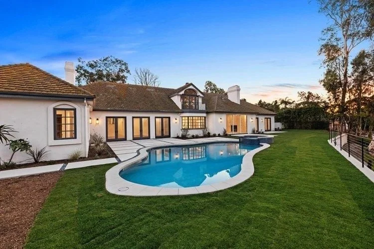 Rental home with pool at sunset