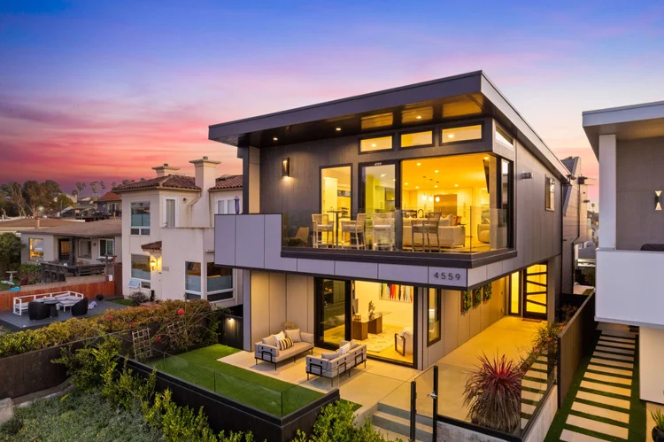 Modern home and patio at twilight