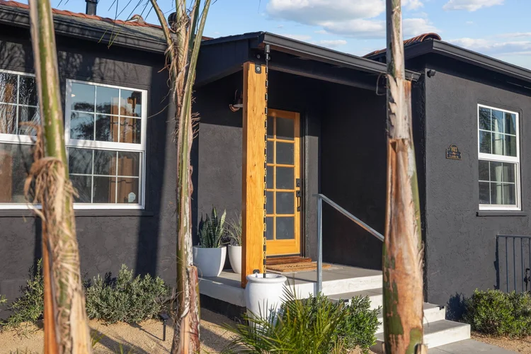 Front entrance of a black modern home