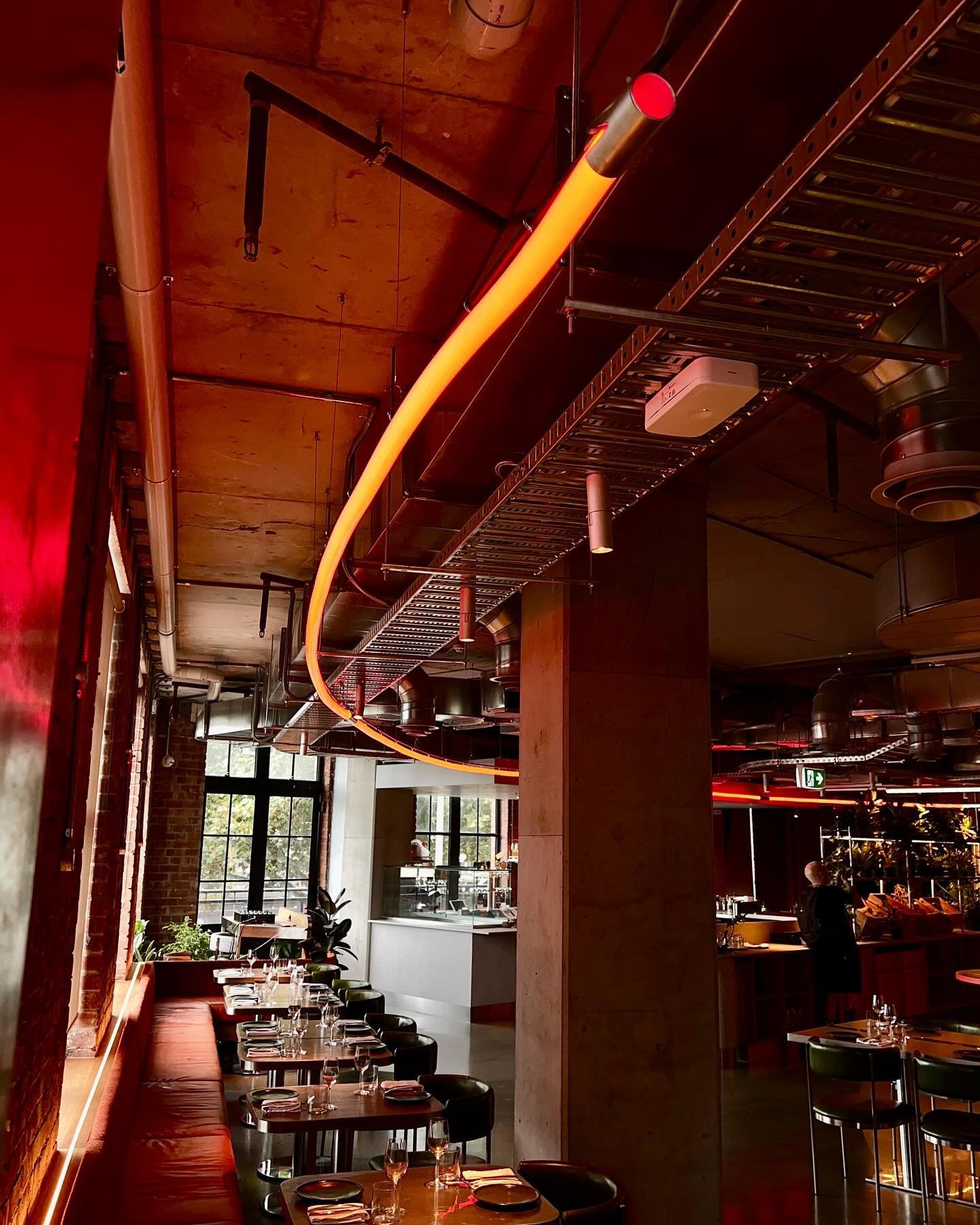 The ARC, a 20-meter streak of vibrant red, zips around @visit_bricklane one of Melbourne&rsquo;s best-kept secrets &ndash; an expansive second-storey restaurant and bar, with panoramic views overlooking the iconic Queen Victoria Market @vicmarket. 

