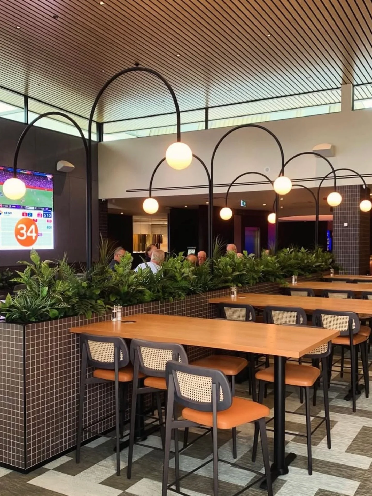 We&rsquo;ve been waiting in anticipation for photos from this Sydney project and while there aren&rsquo;t many to share just yet, these custom lights deserve a moment.

They&rsquo;re sculptural pieces with broad, curved metal arms that sweep out over