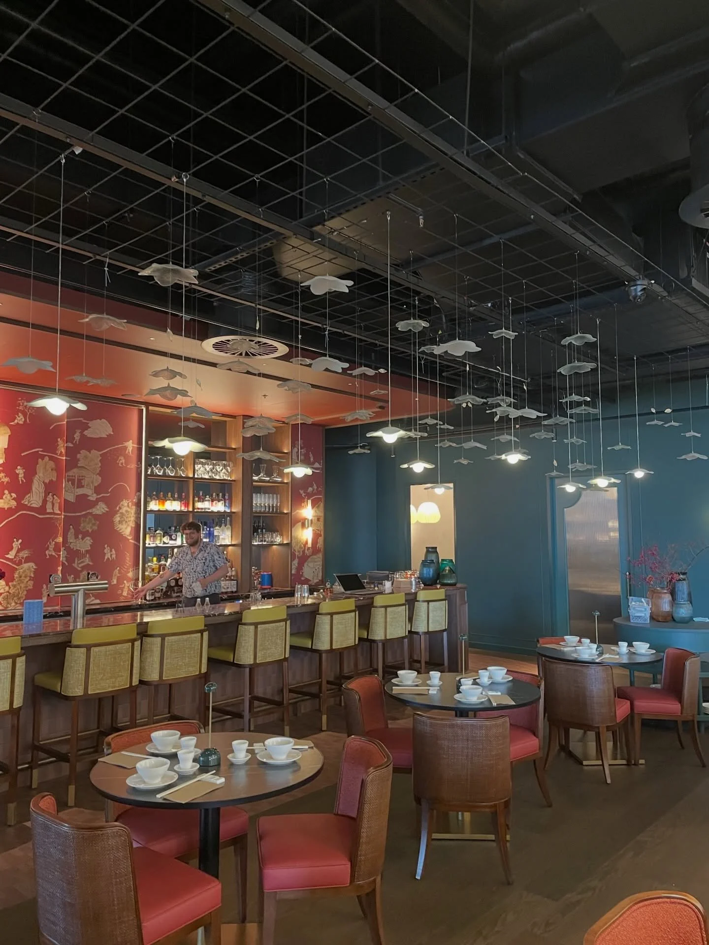 Unfolding across the ceiling like a meadow in bloom, the SAKURA BLOOM installation at @hua_brisbane is delicate in detail, yet immersive in scale.

Blooming blossoms of glass droplets drift above, some softly illuminated to cast a gentle glow, while 