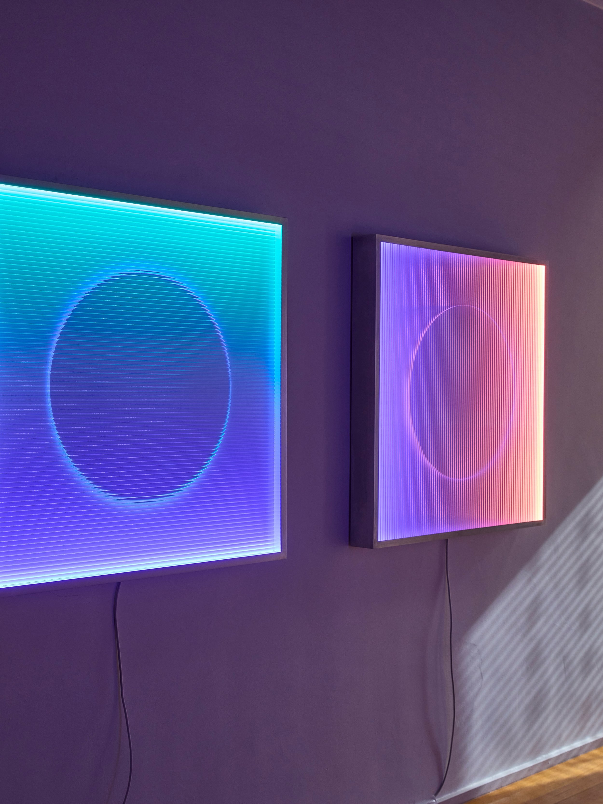 Named after the atmospheric optical phenomenon created when light interacts with ice crystals, 22 Degrees Halo I &amp; II uses ultra-clear reeded glass to capture and redirect light toward its centre.

The result is the illusion of a floating halo su
