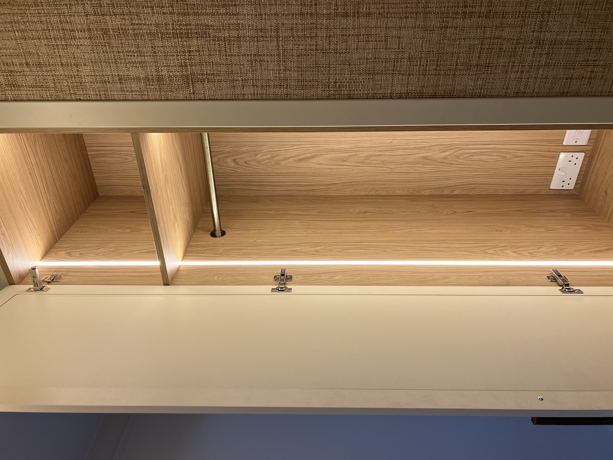 “Bespoke wardrobe design with custom shelving and hanging space in modern family home.”