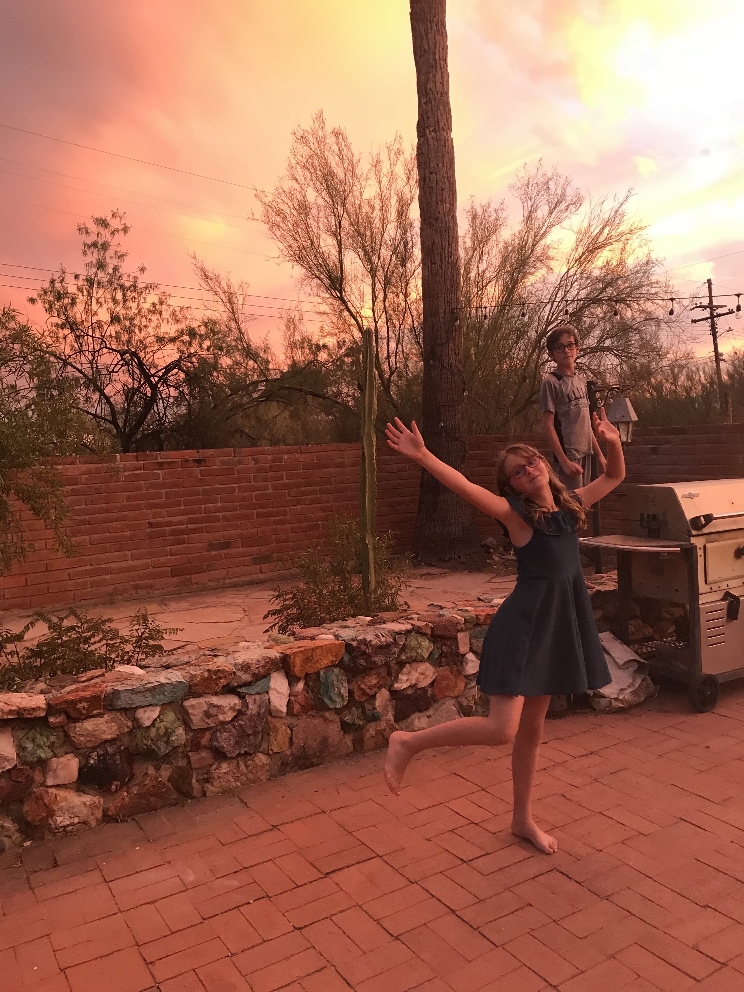  Sunsets during monsoon season in southern Arizona are magical. My children, Gus and Cora, celebrate the sky. 