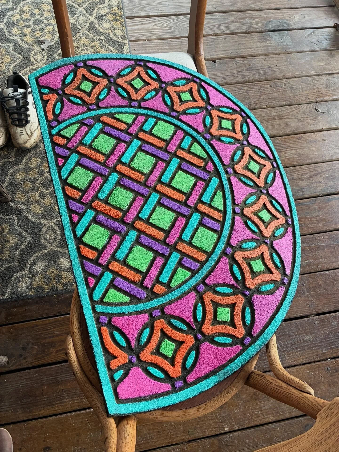Painted an old, worn rubber door mat. It was glorious going analog for a couple of hours. More of this!