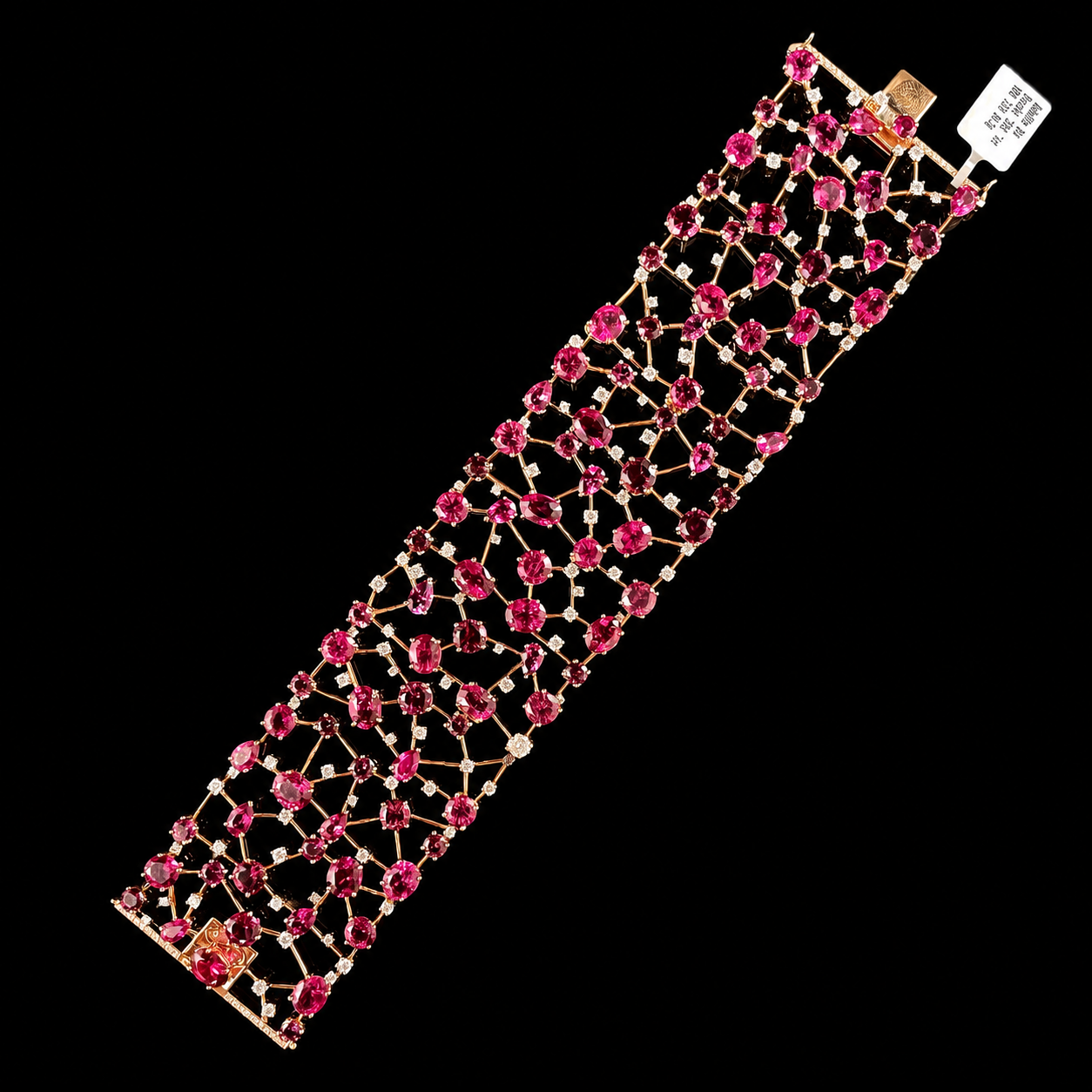 18K Rose Gold Rubellite Tourmaline and Diamond Bracelet Layed Out.png