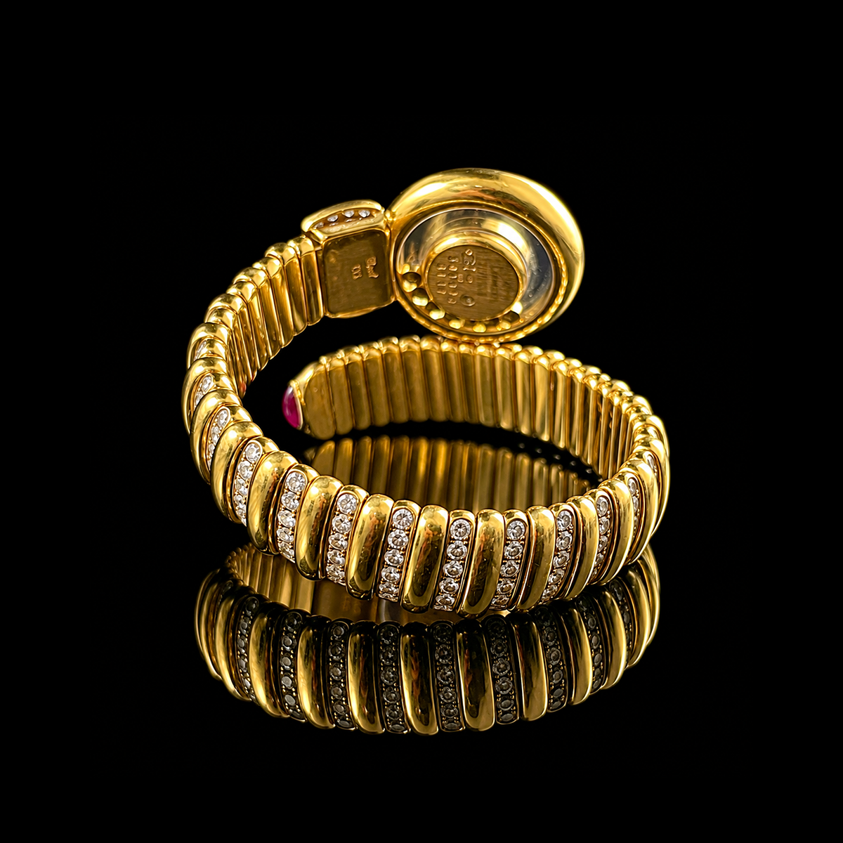 Chopard Happy Diamonds Tubogas Watch in 18K Yellow Gold Back.png