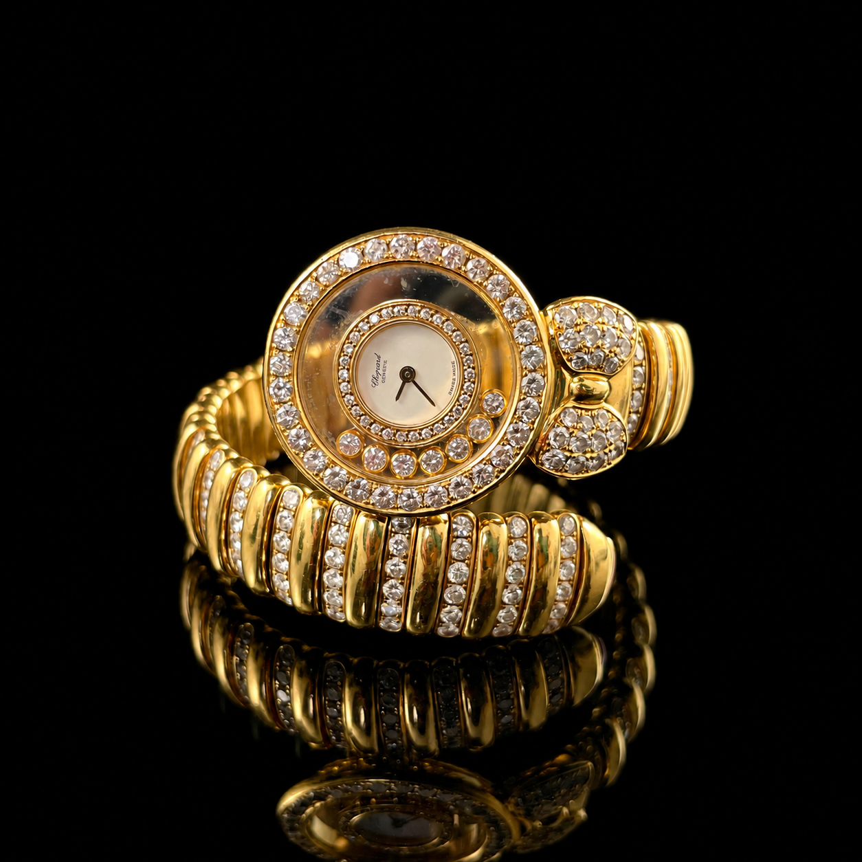 Chopard Happy Diamonds Tubogas Watch in 18K Yellow Gold.png