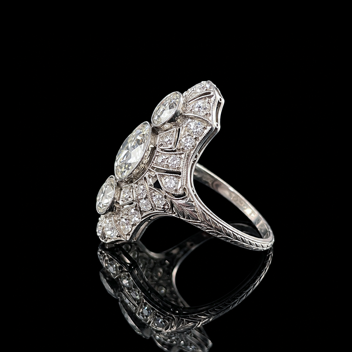 Art Deco Platinum Diamond Three-Stone Ring Side.png