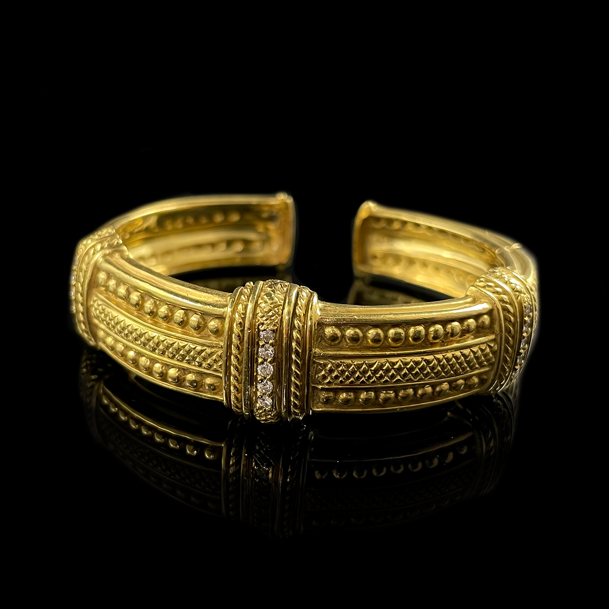 18K Yellow Gold cuff bracelet signed Judith Ripka.png