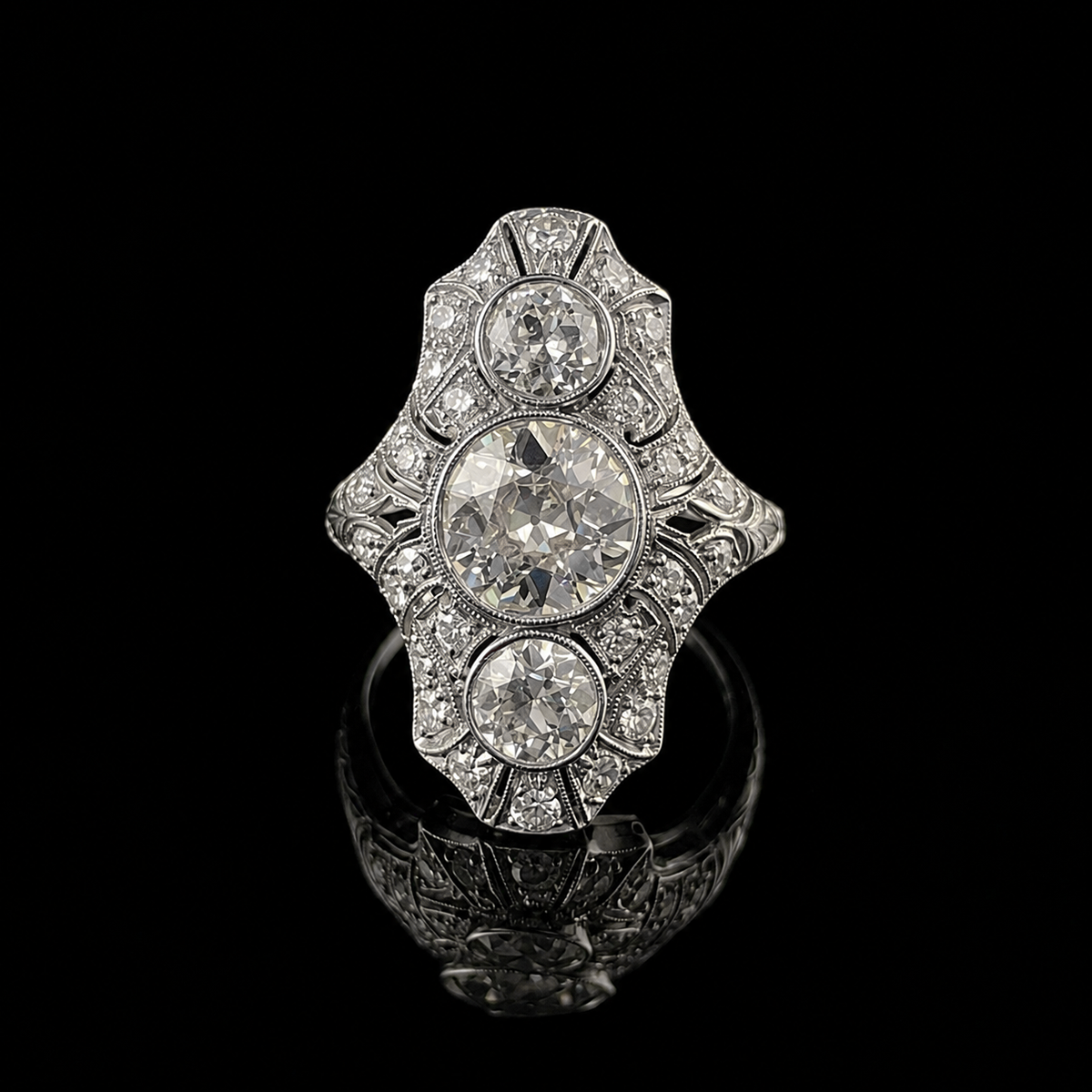 Art Deco Platinum Diamond Three-Stone Ring.png