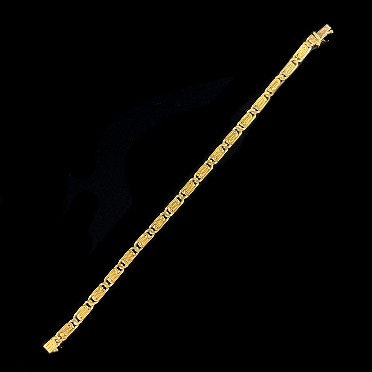 18K Yellow Gold Greek Key Bracelet Layed Out.png